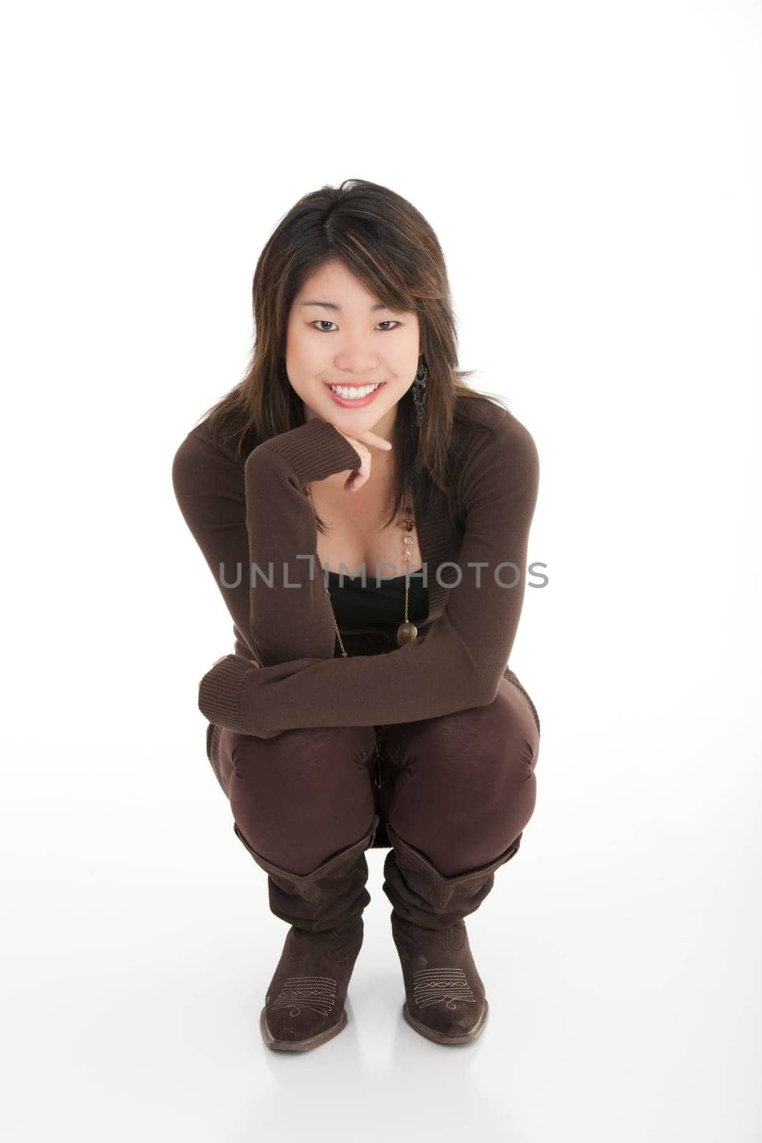 Asian teenager with some attitude on white background