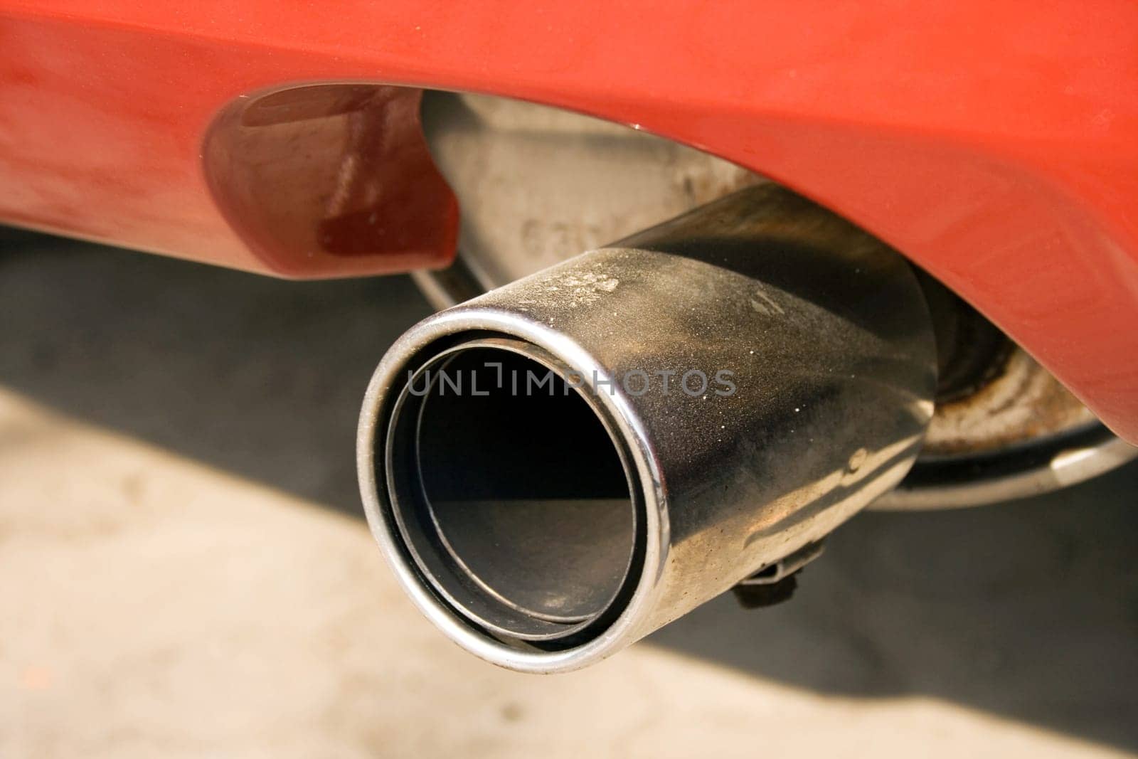 sporting muffler of dark blue car