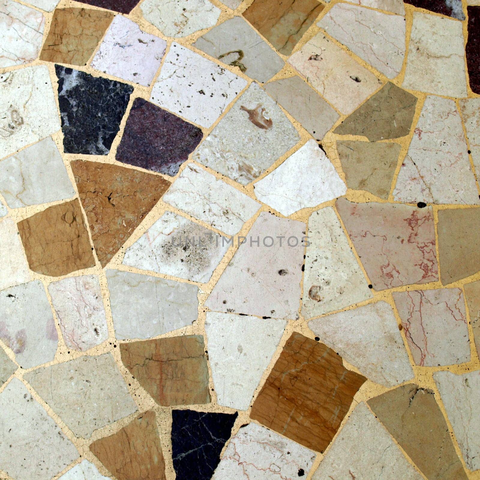 A floor with irregular tiles (opus incertum)