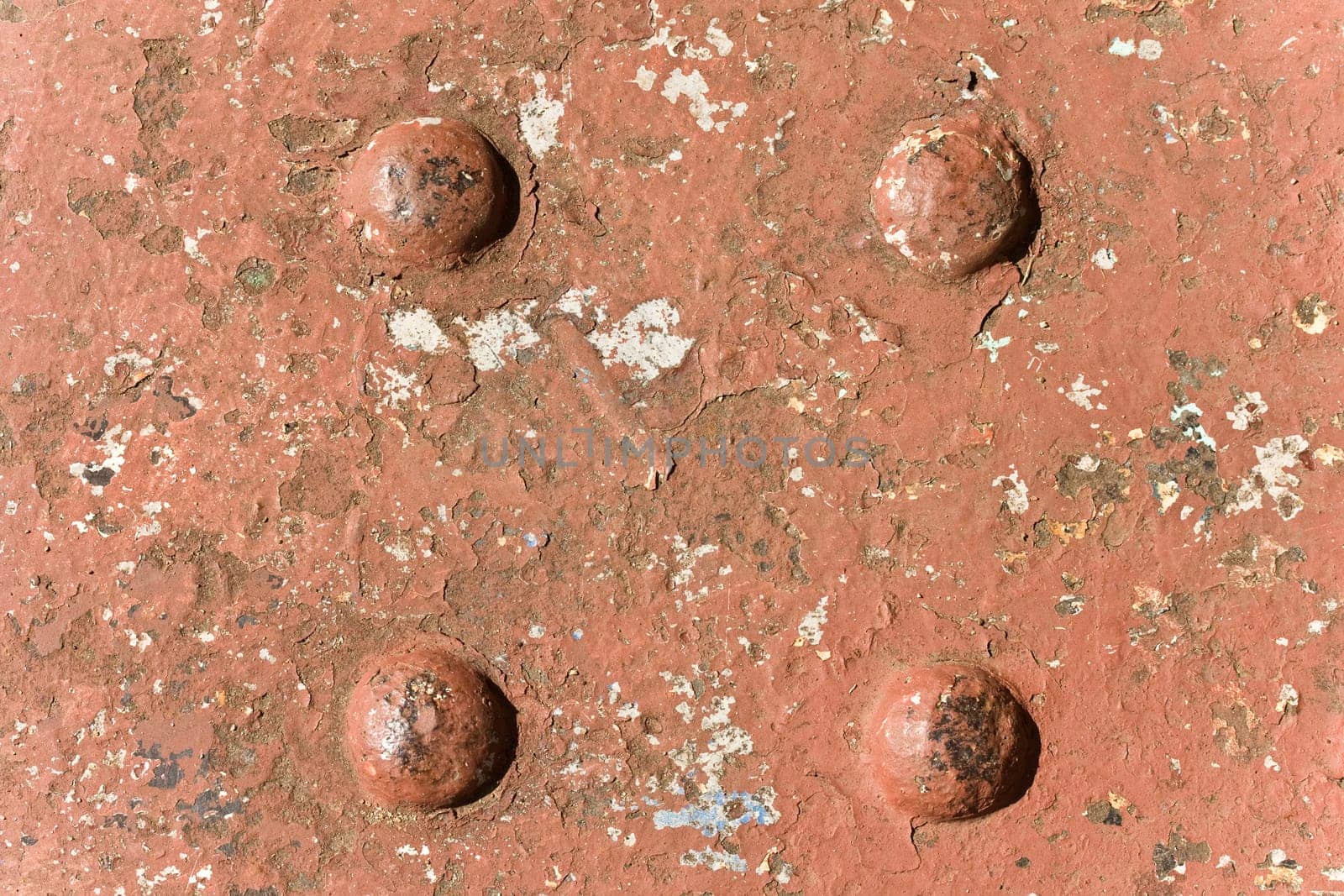 Close up of wrought iron structure that has been hot riveted