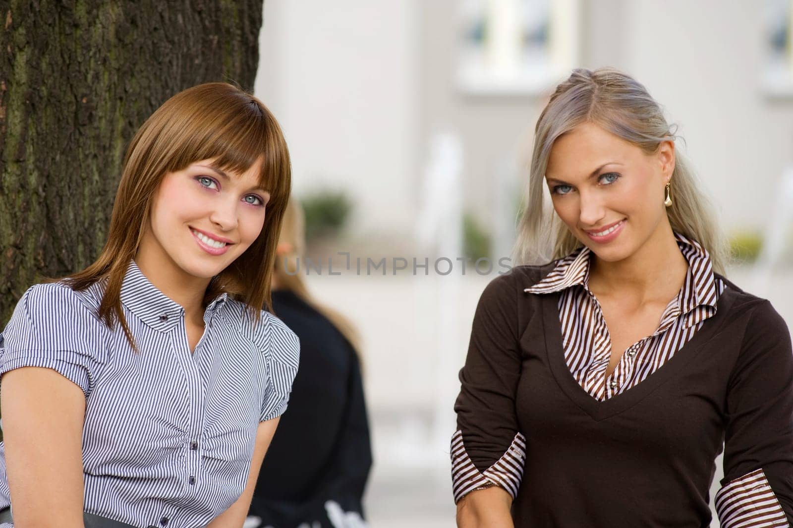 nice  outdoor portrait of cute girls looking in camera smiling