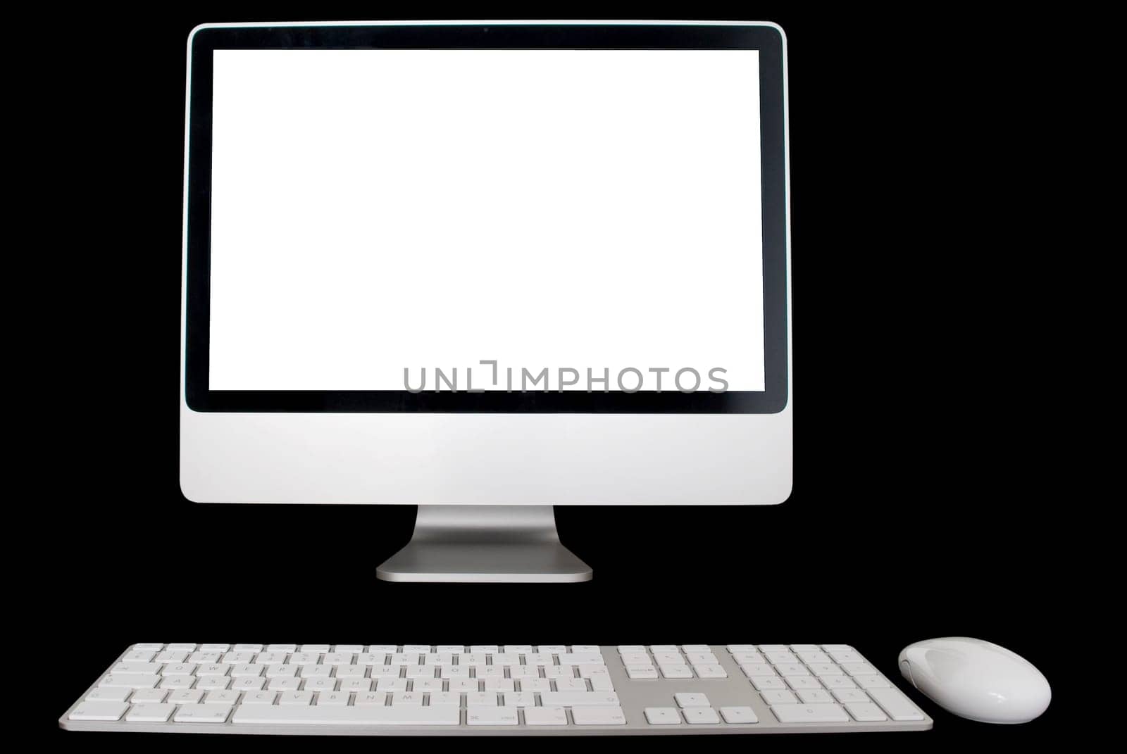 White Monitor, keyboard and mouse isolated over black background