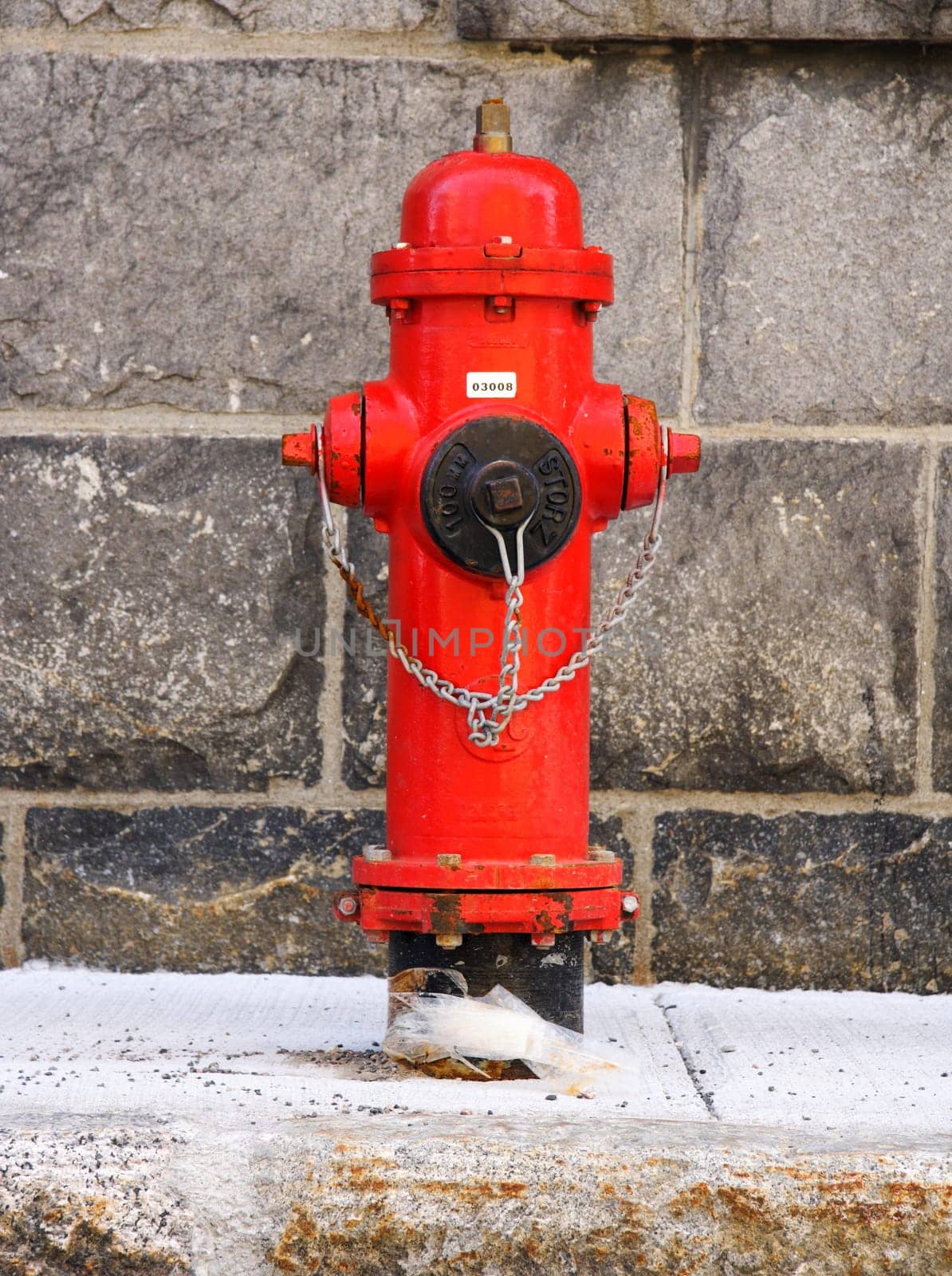 Typical red fire hydrant. Quebec city.