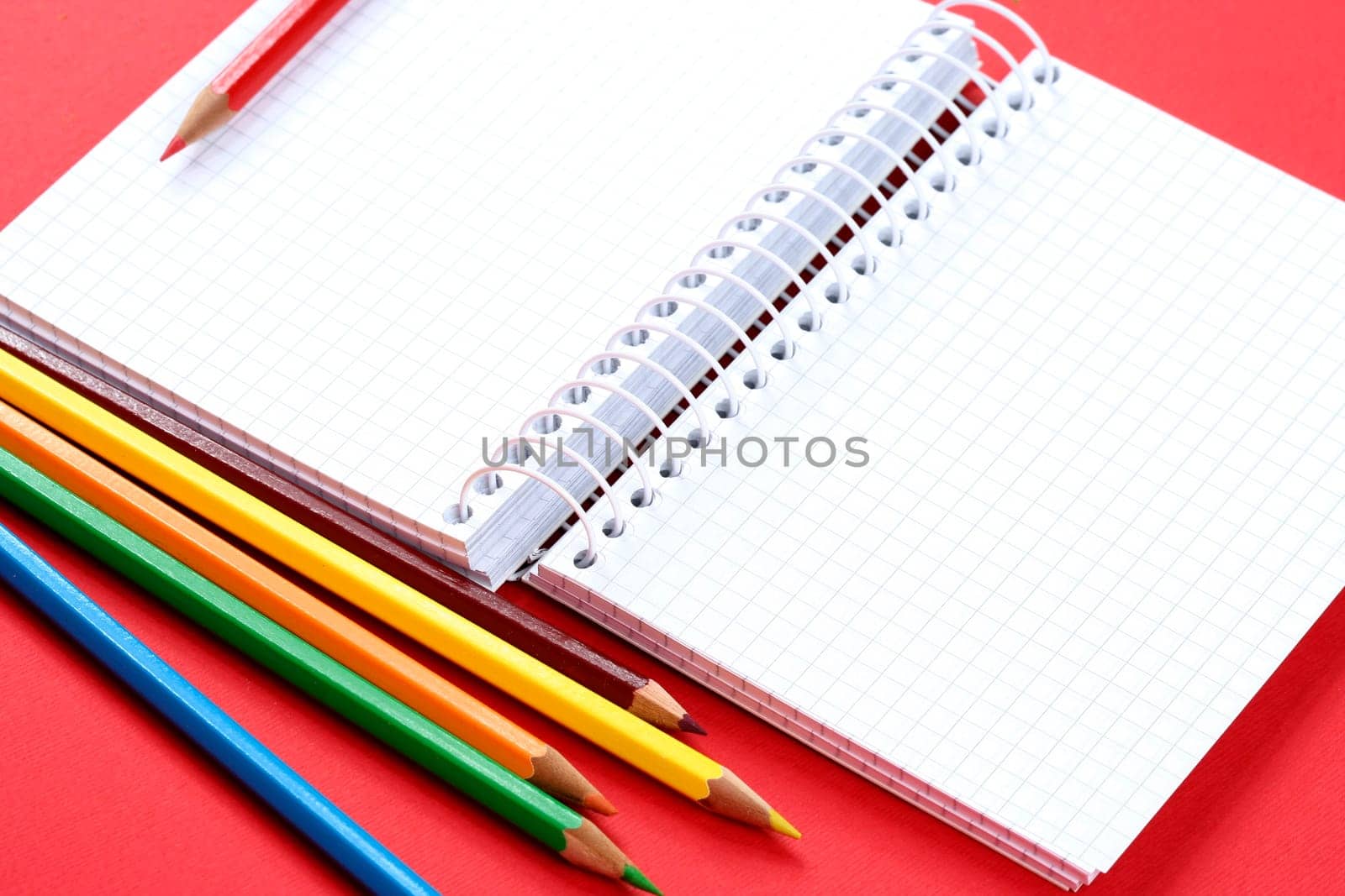 Close-up of pencil and agenda