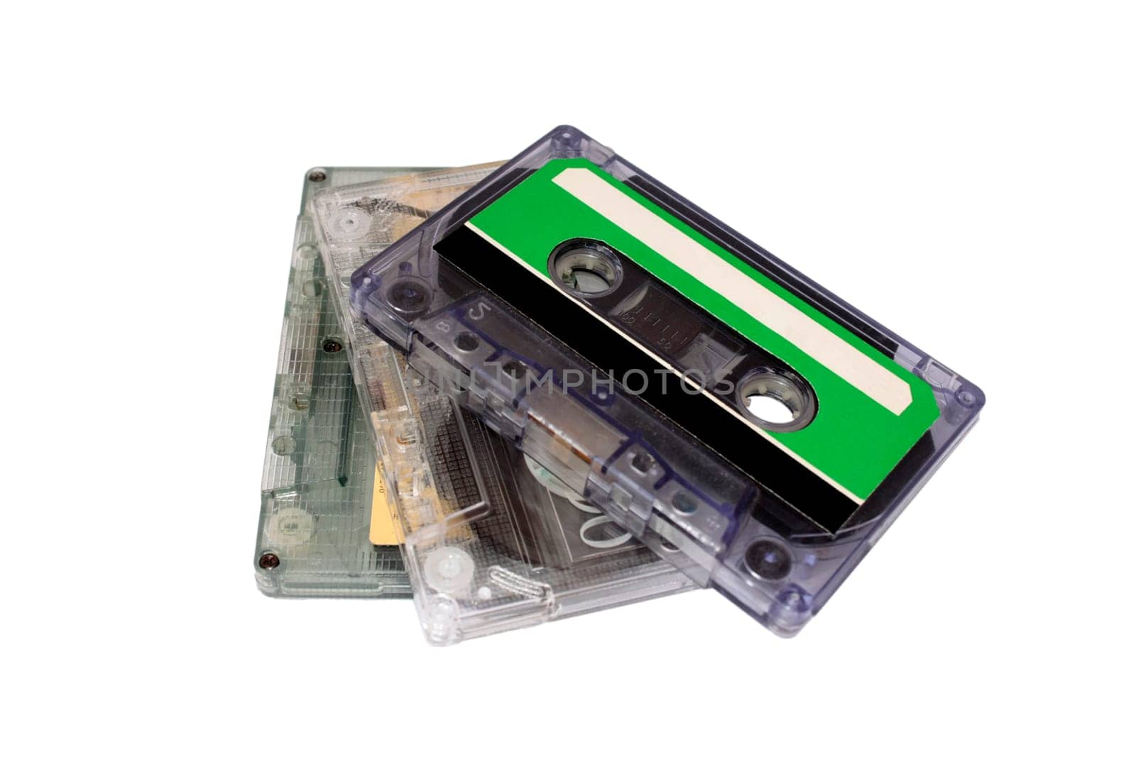 Three Compact Cassette isolated on white.