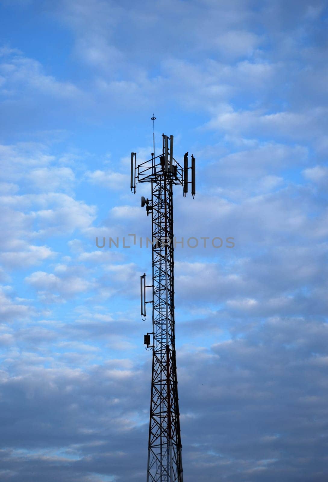 multiple antenna communications tower - tv, radio, cellphones, telephones microwave data links etc