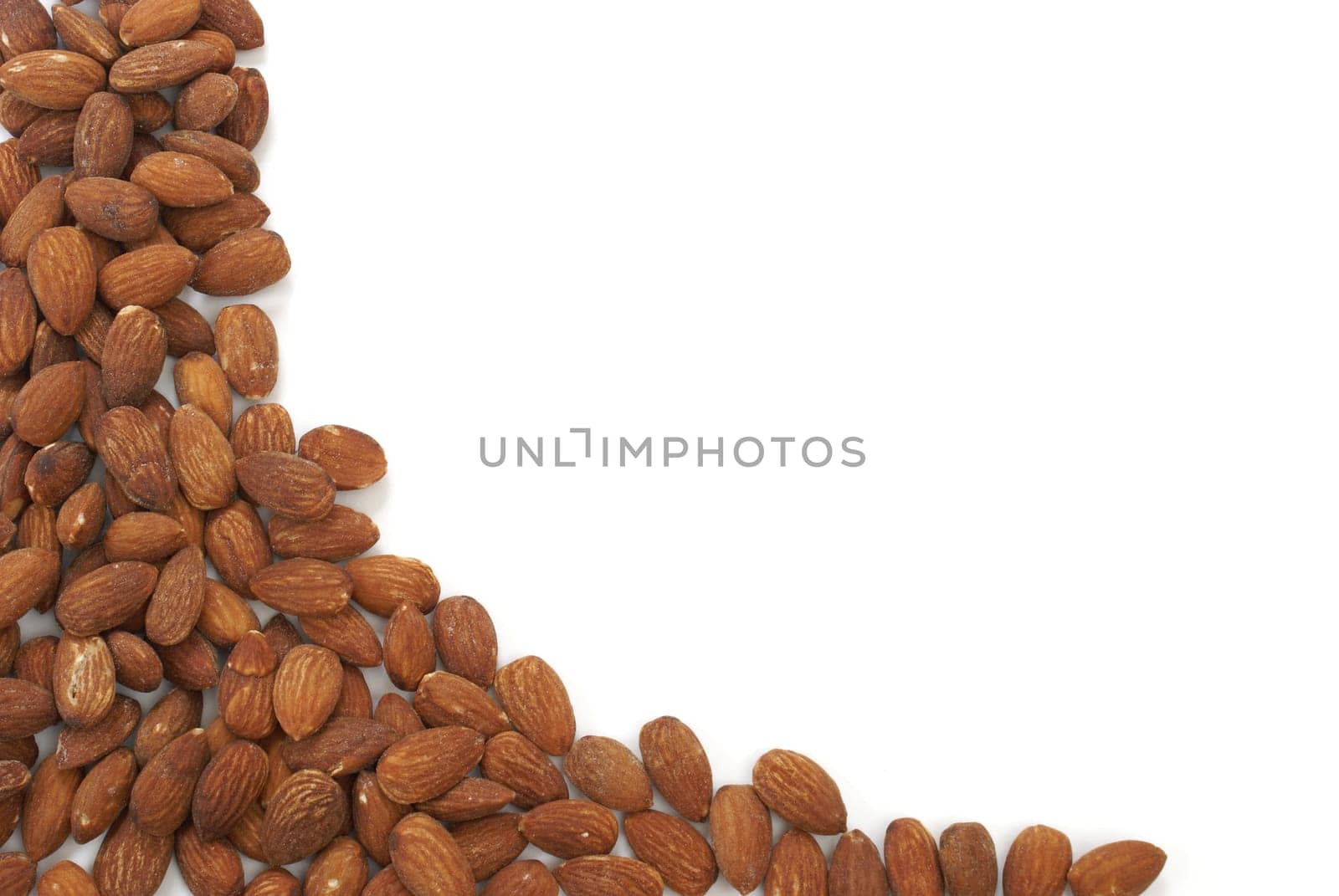 Almonds piled to the side of the frame to create an interesting border.