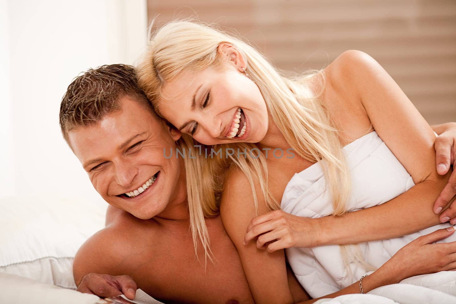 Couple having fun in bed