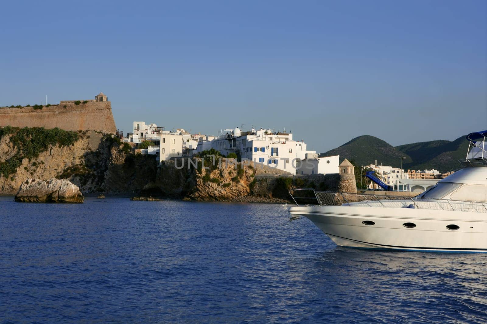 Ibiza landmark island in Mediterranean sea, blue harbor view