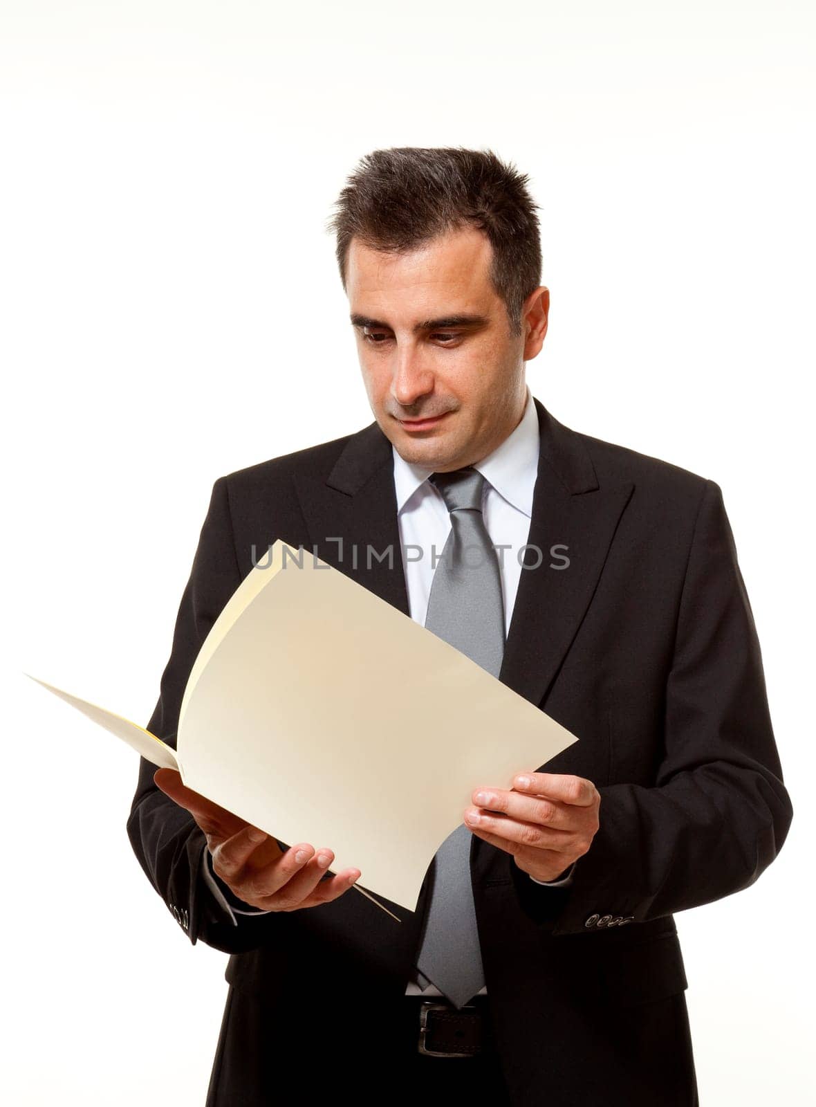 Businessman reads a document with query