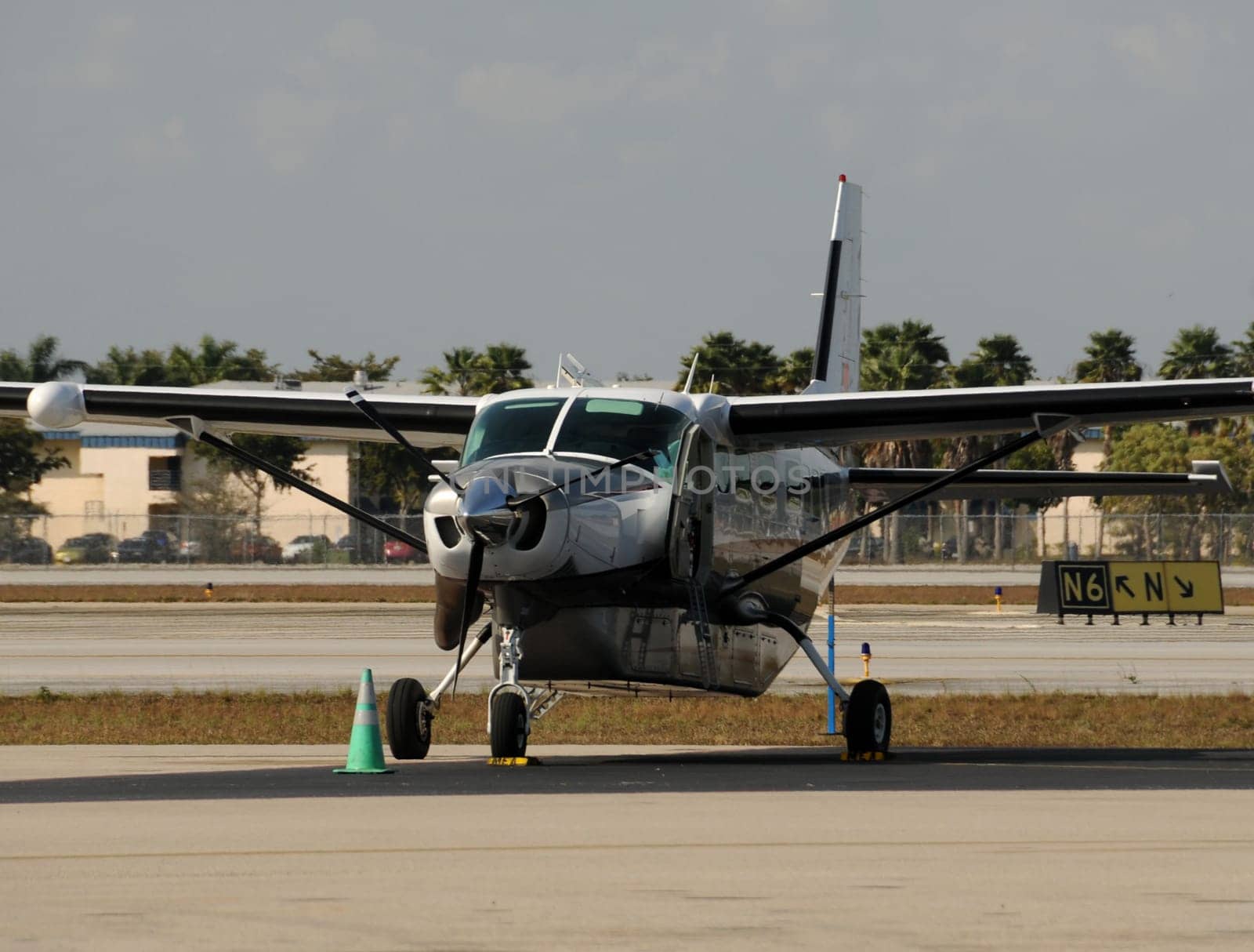 Propeller airplane parked on the ground