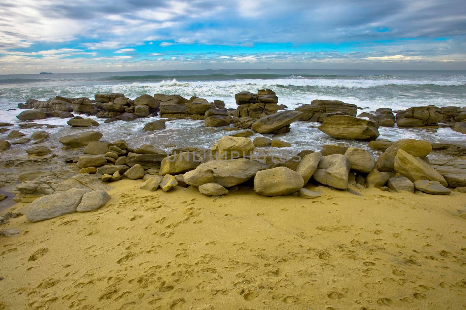 Beach wide angle with breaking waves
