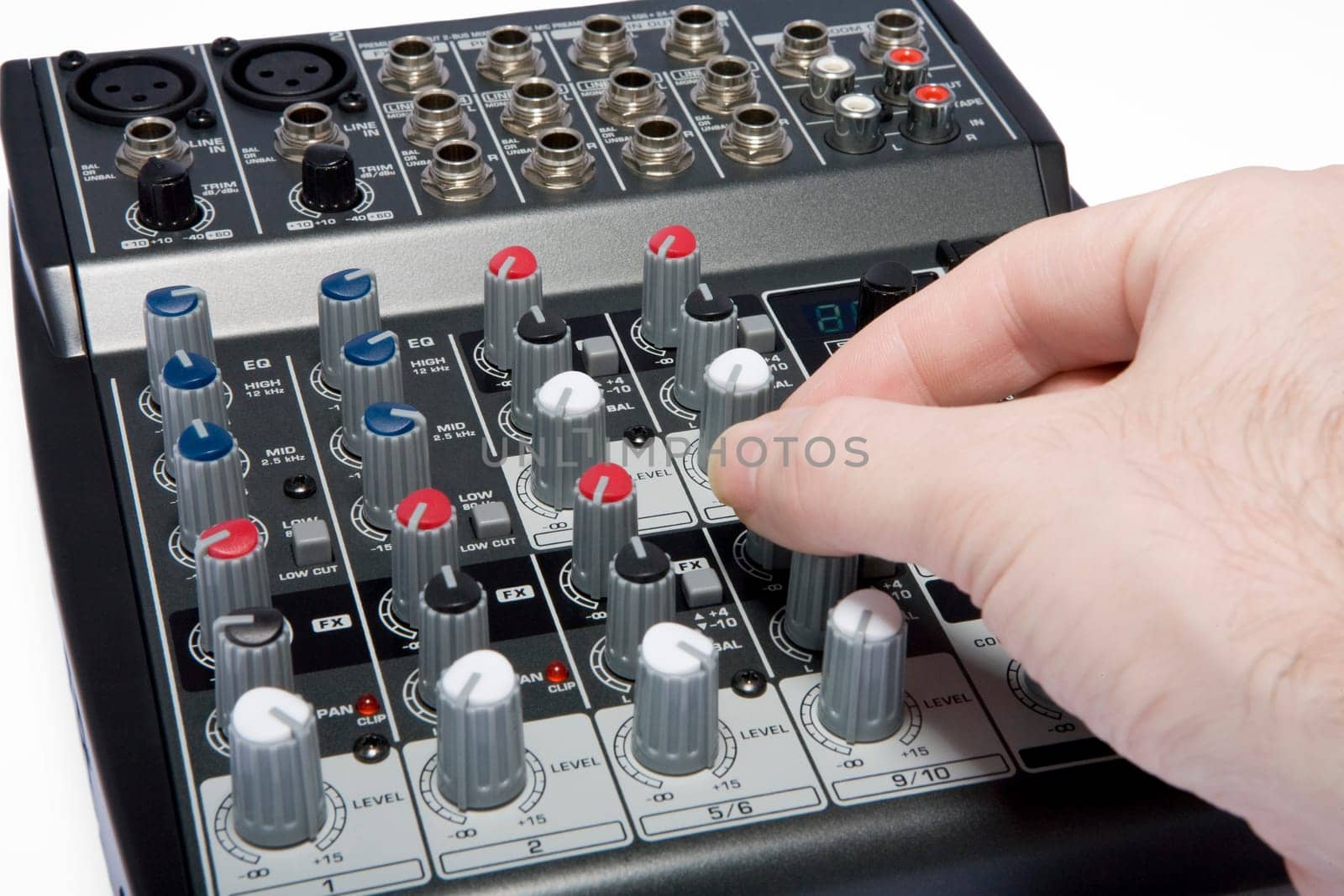 A professional audio / disk jockey / karaoke mixer on a white background