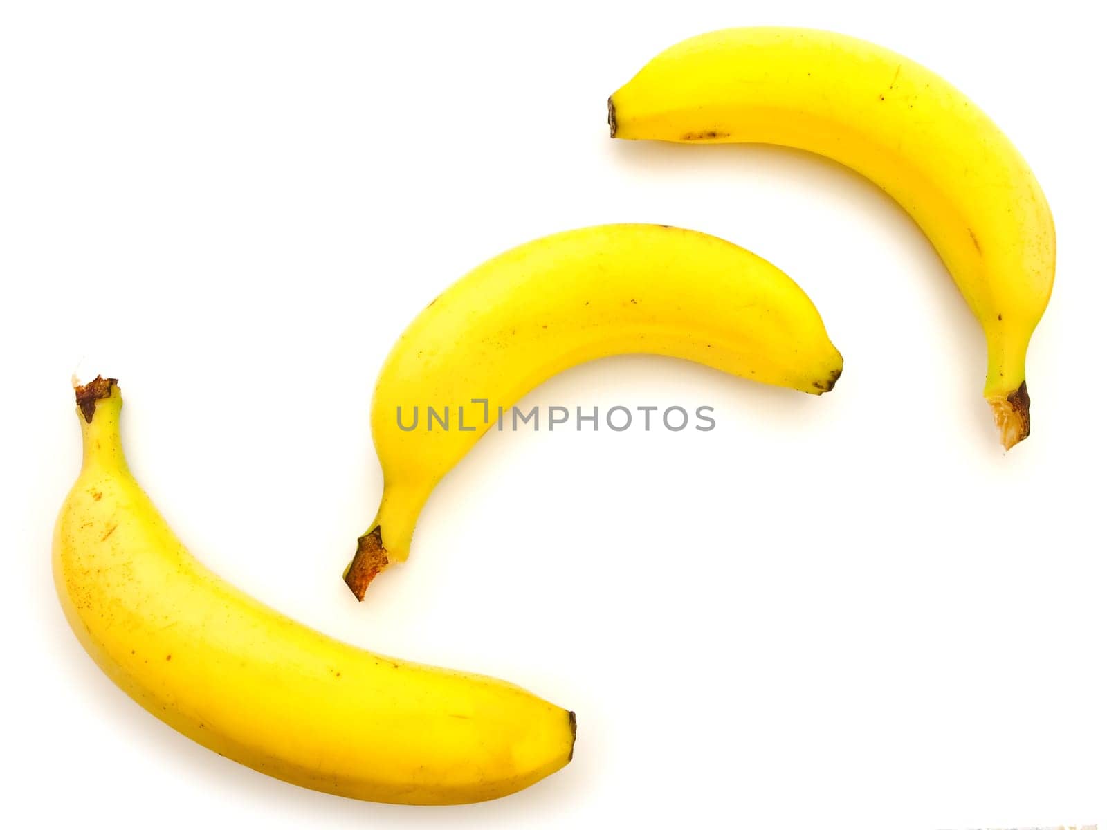 photo of the yellow banana against the white background