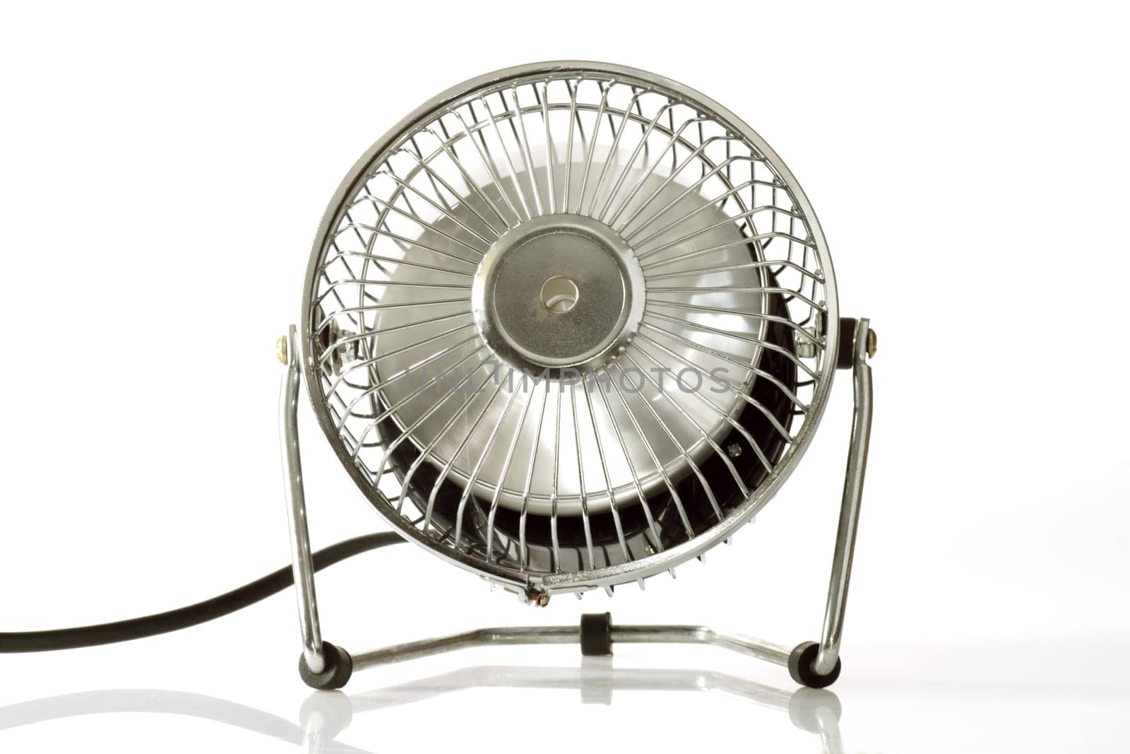 Electric silver fan  on bright background