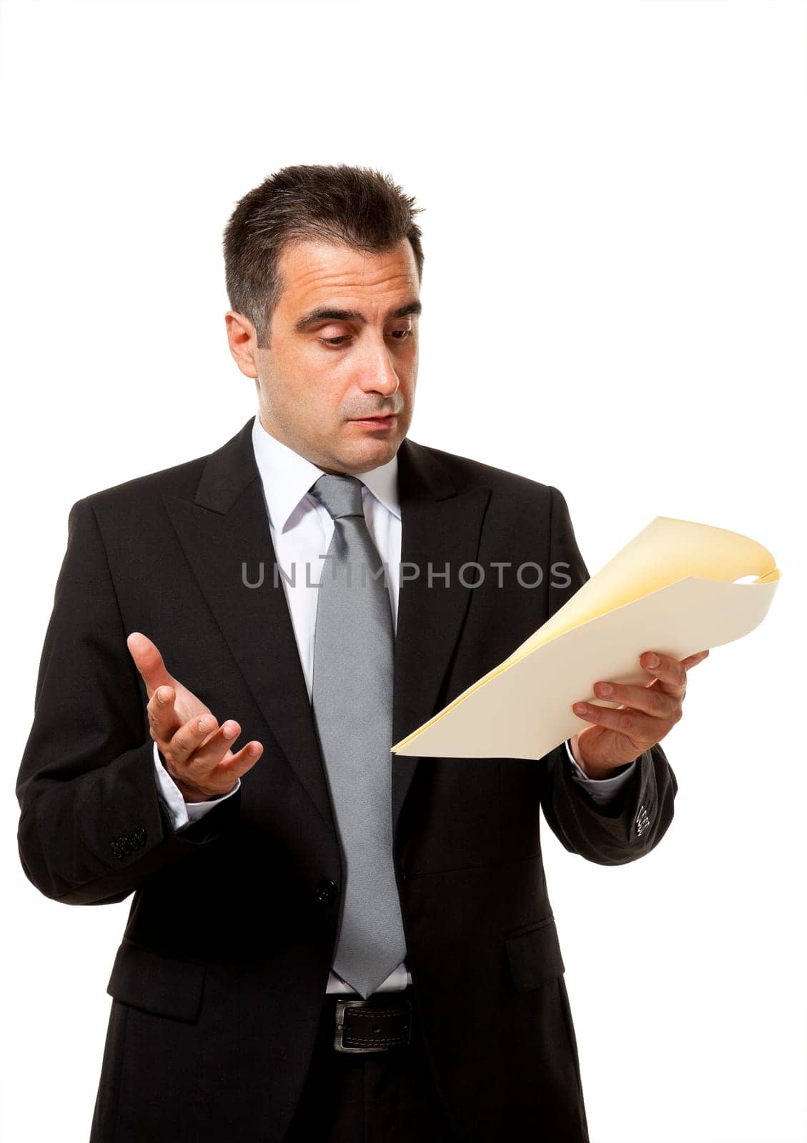 Businessman reads a document with query