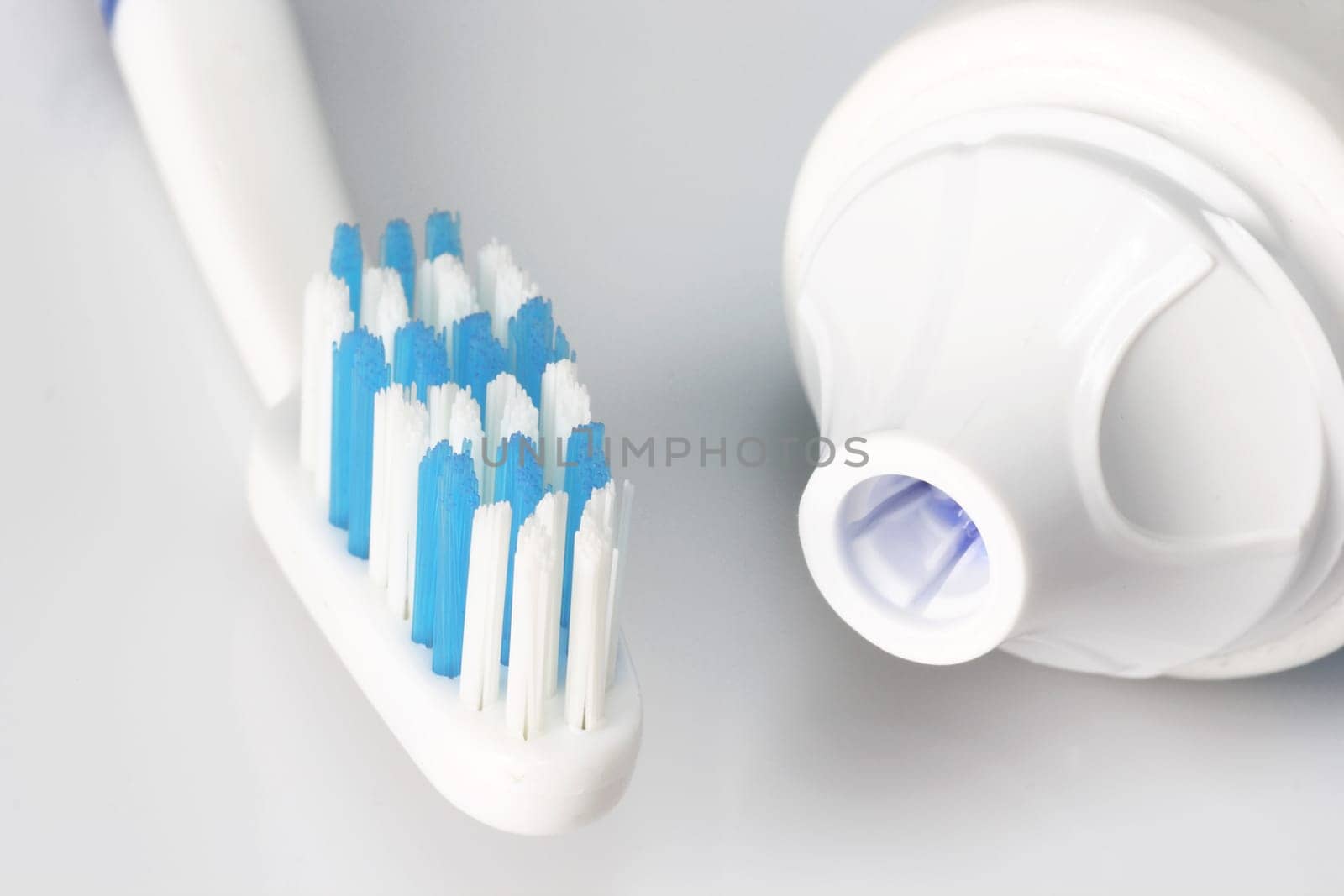 Dental care products on bright background
