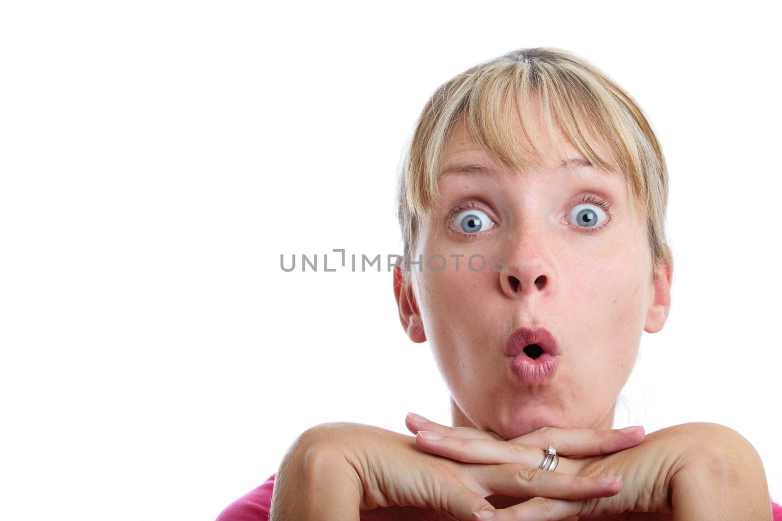 Surprised woman looking up with white background