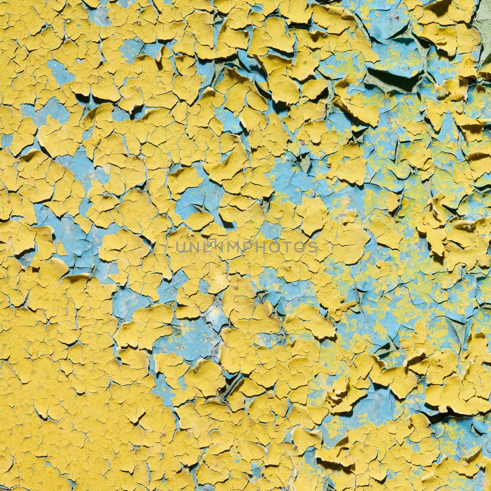 Yellow decayed concrete painted old wall texture