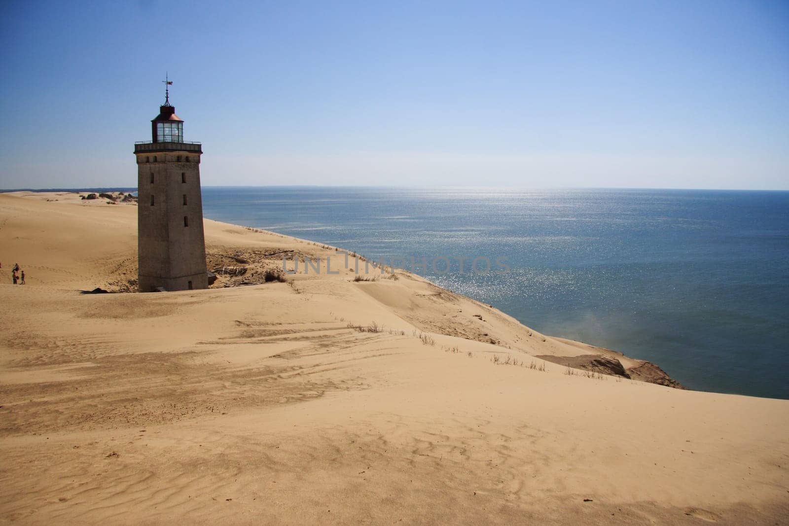 Lighthouse in the sand dunes of Rubjerg Knude in Denmark