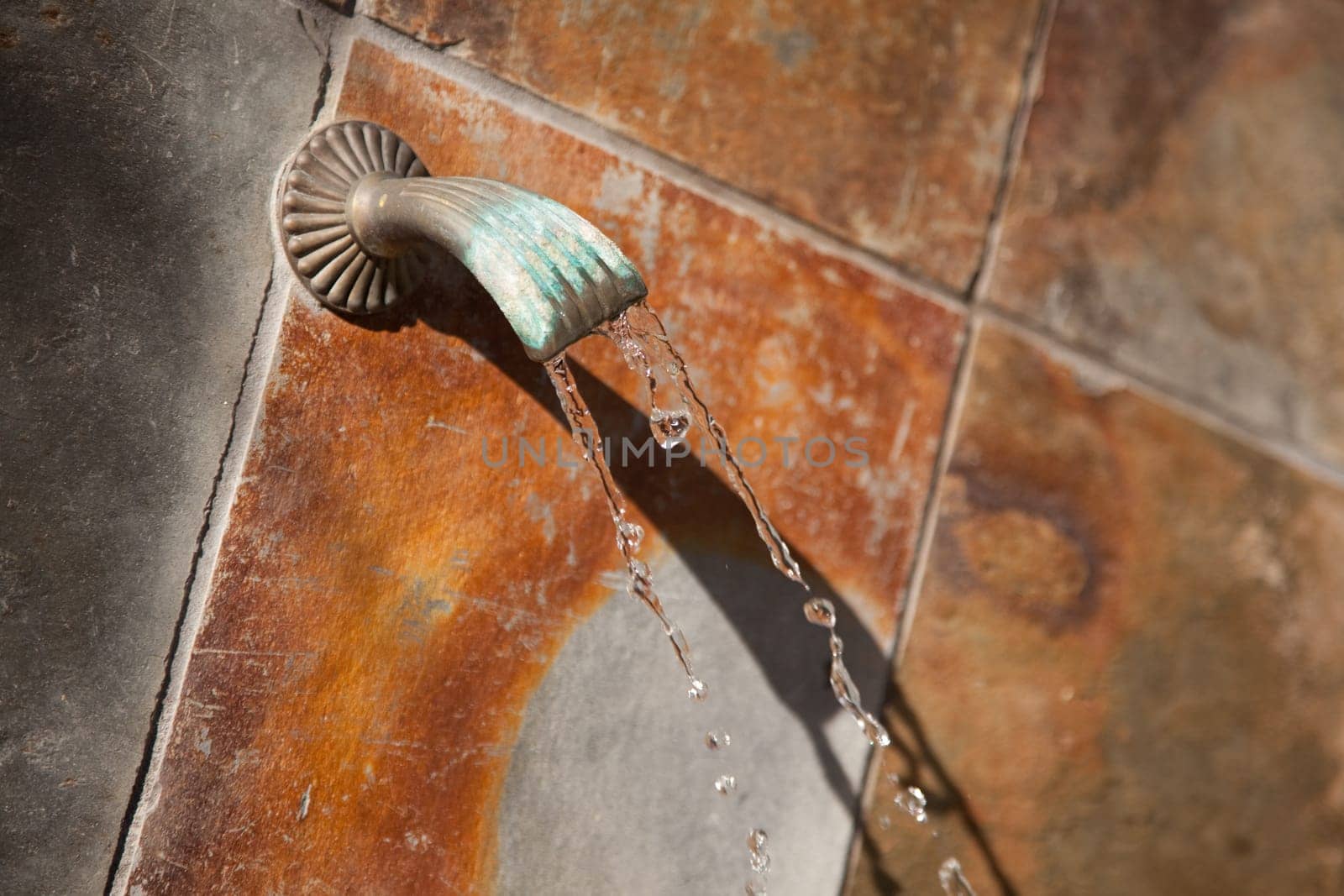 Beautiful Stone Wall Water Fountain Abstract Image.