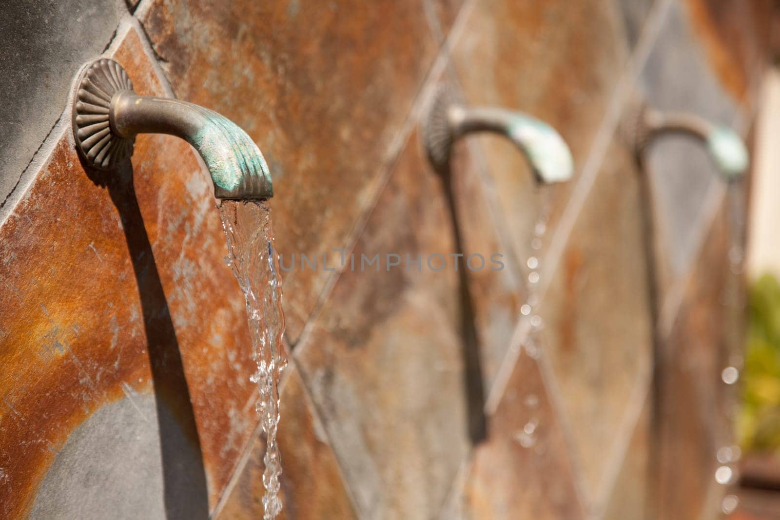 Beautiful Stone Wall Water Fountain Row Abstract.