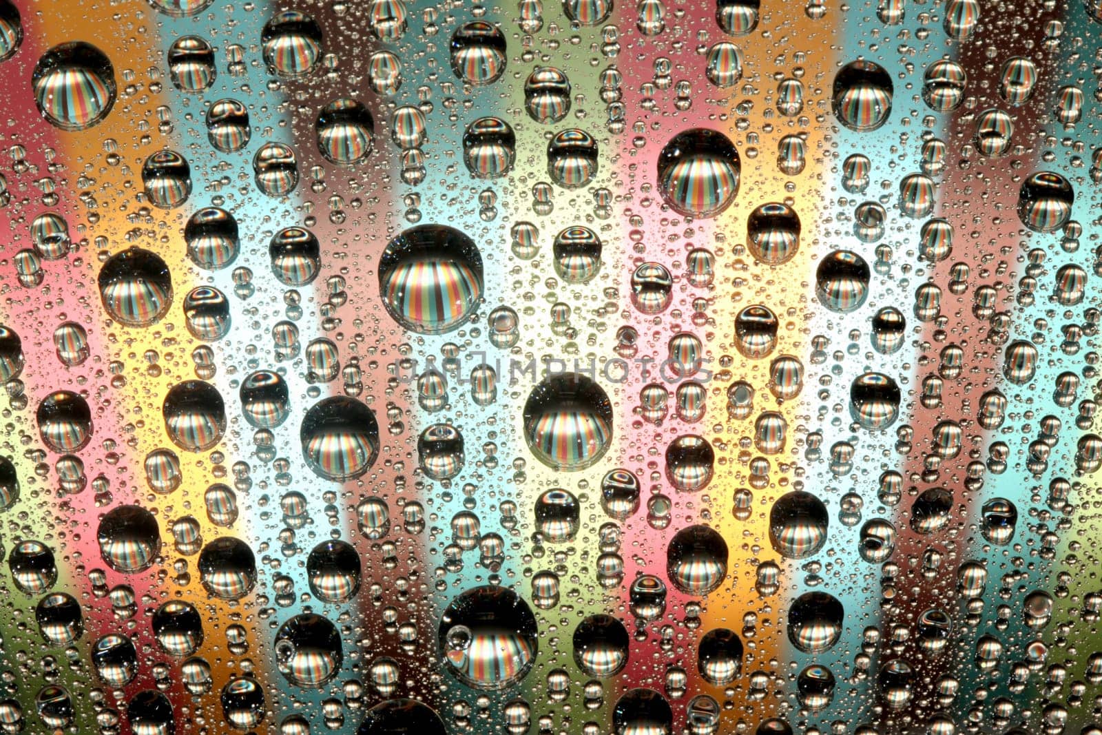 macro of colorful water drops and bubbles
