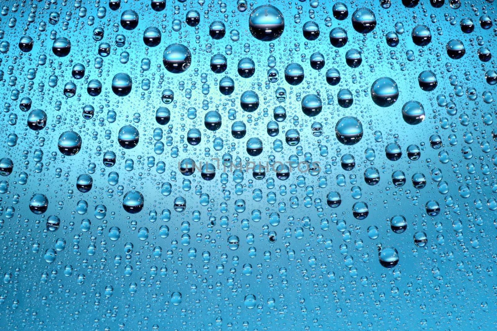 macro of blue water drops and bubbles