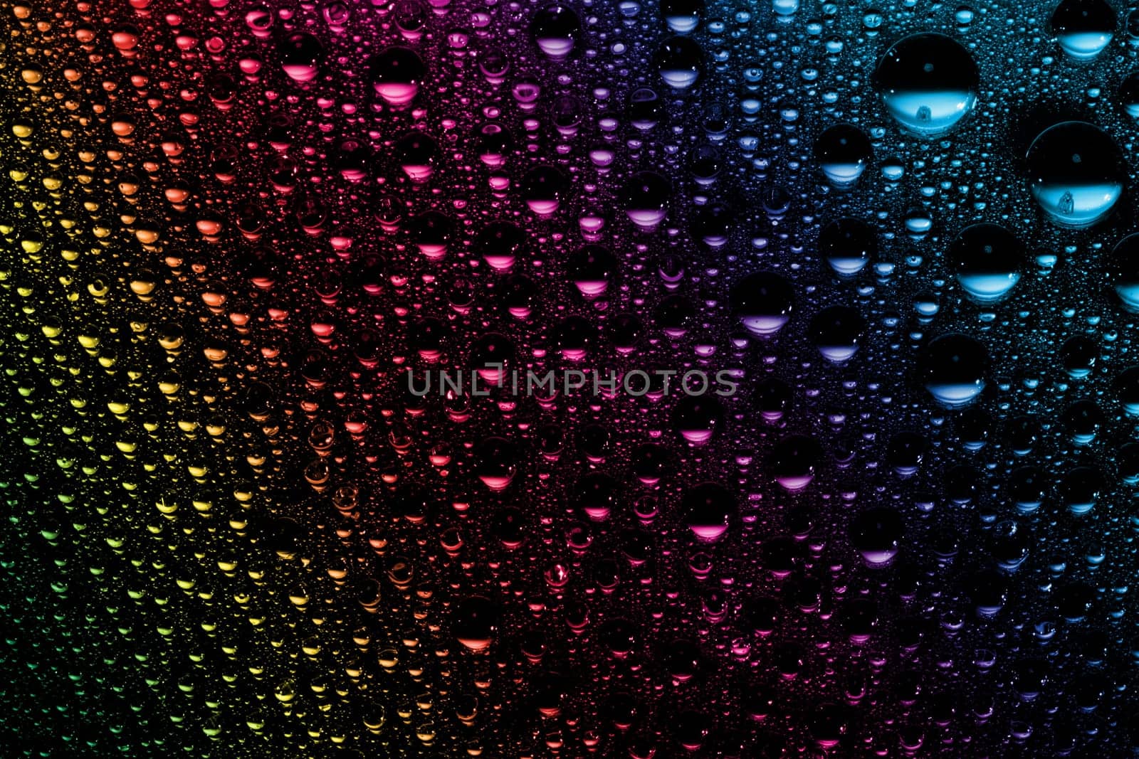 macro of colorful water drops and bubbles