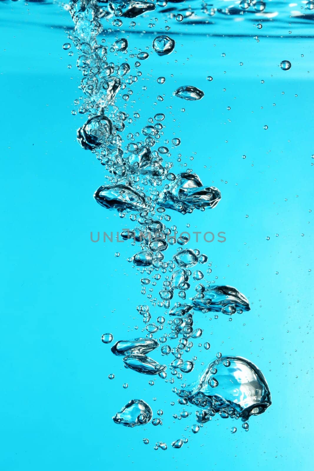 macro of blue water drops and bubbles