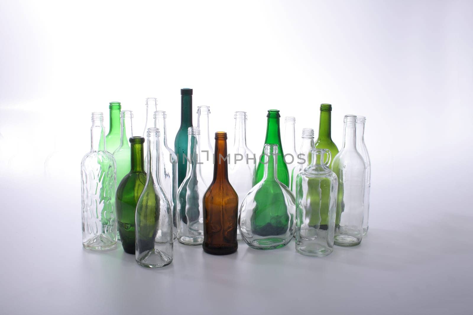 color glass bottles on the white background