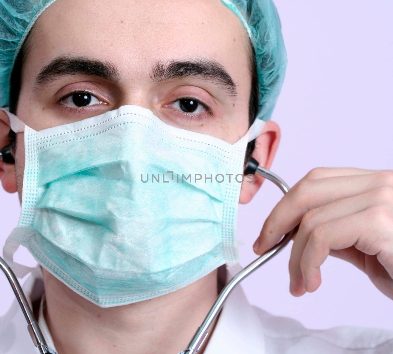 Portrait of a young doctor with stethoscope. More of this series on my portfolio !