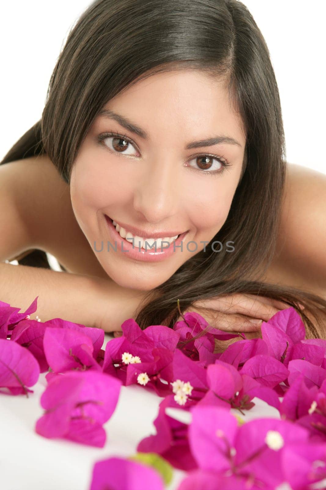 Beautiful indian woman portrait with boungainvilleas flowers over white