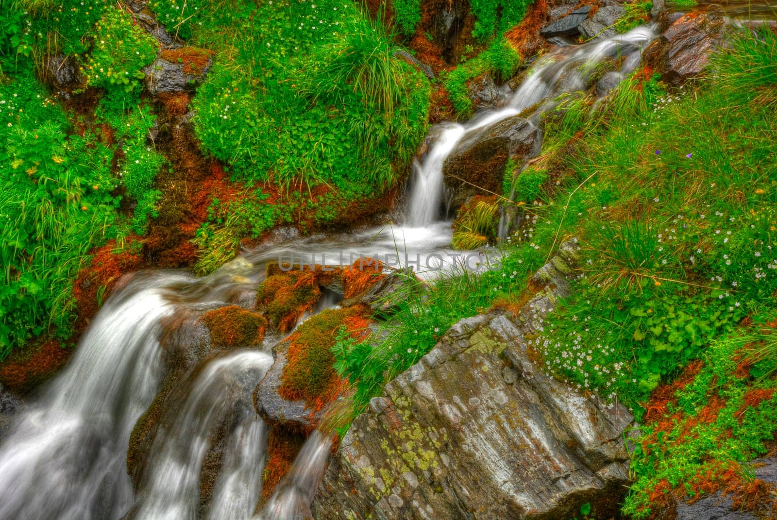beautiful cascade in the morning light,  HDR. Long exposure time gives an "out of time"" feeling."