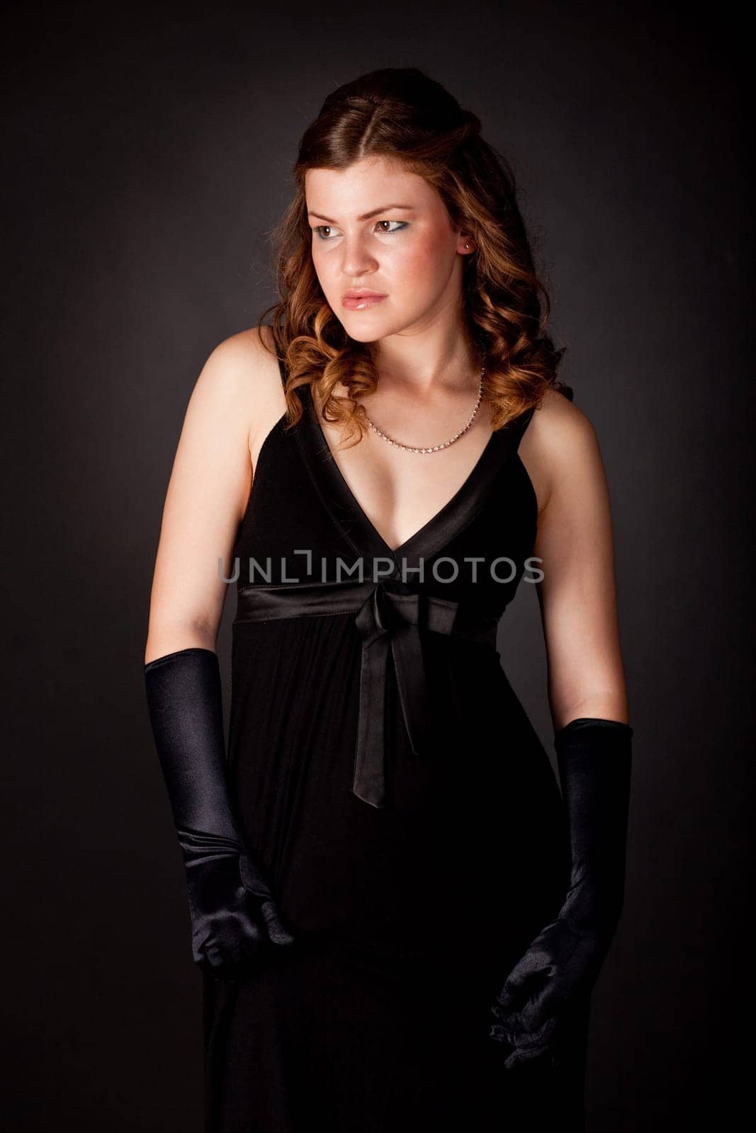 Serious young woman looking away