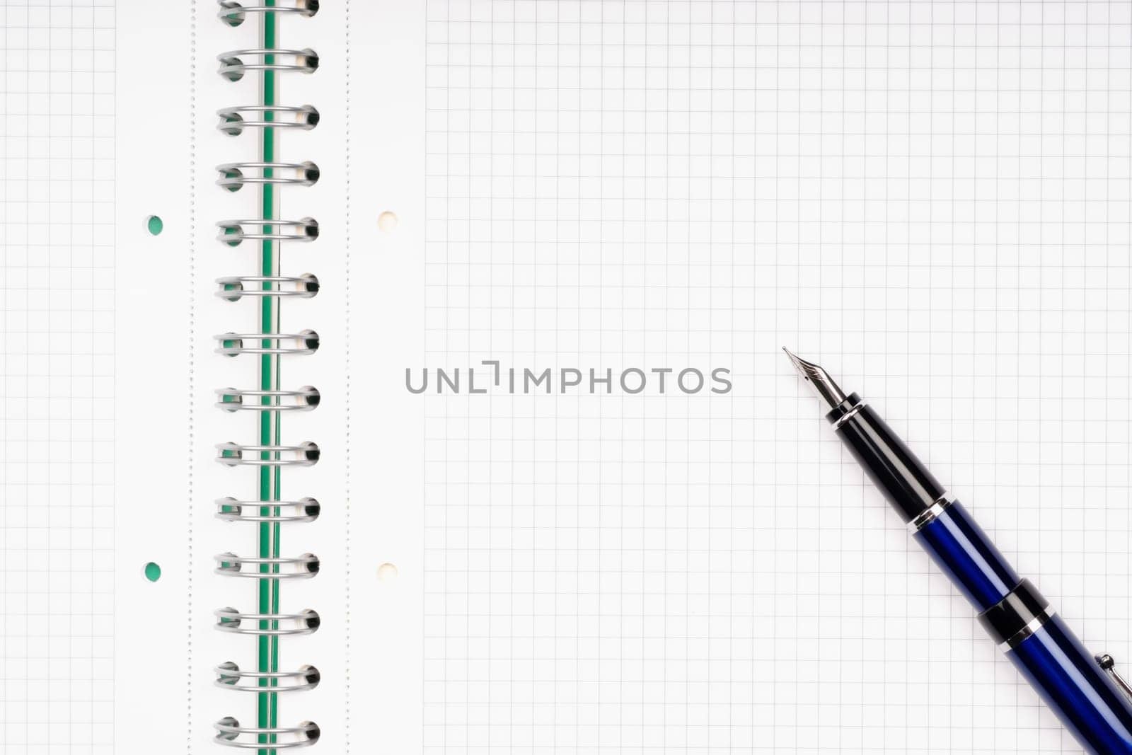close up of notebook and pencil on white background with clipping path
