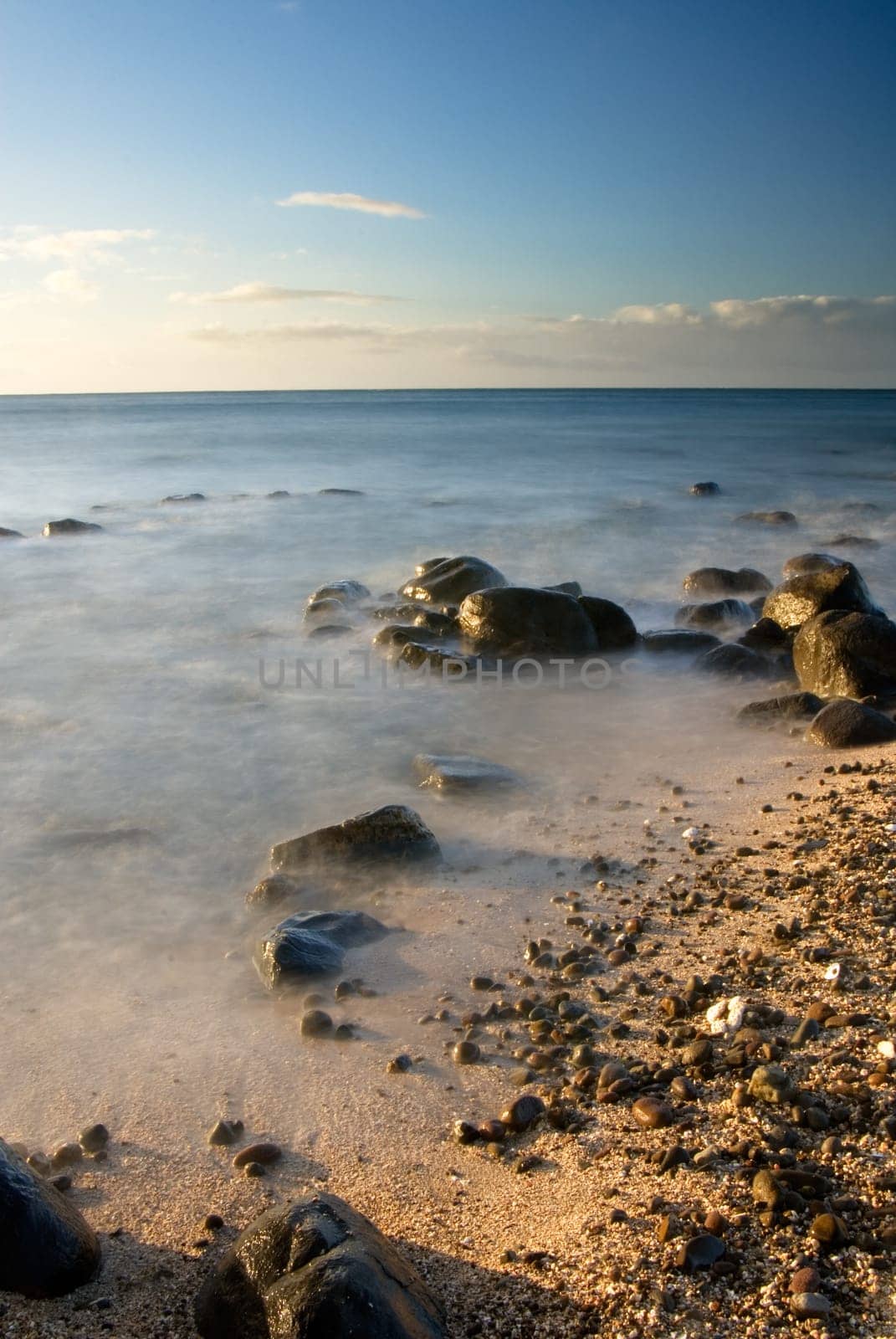 It is sunset of beautiful coral reef coastline.