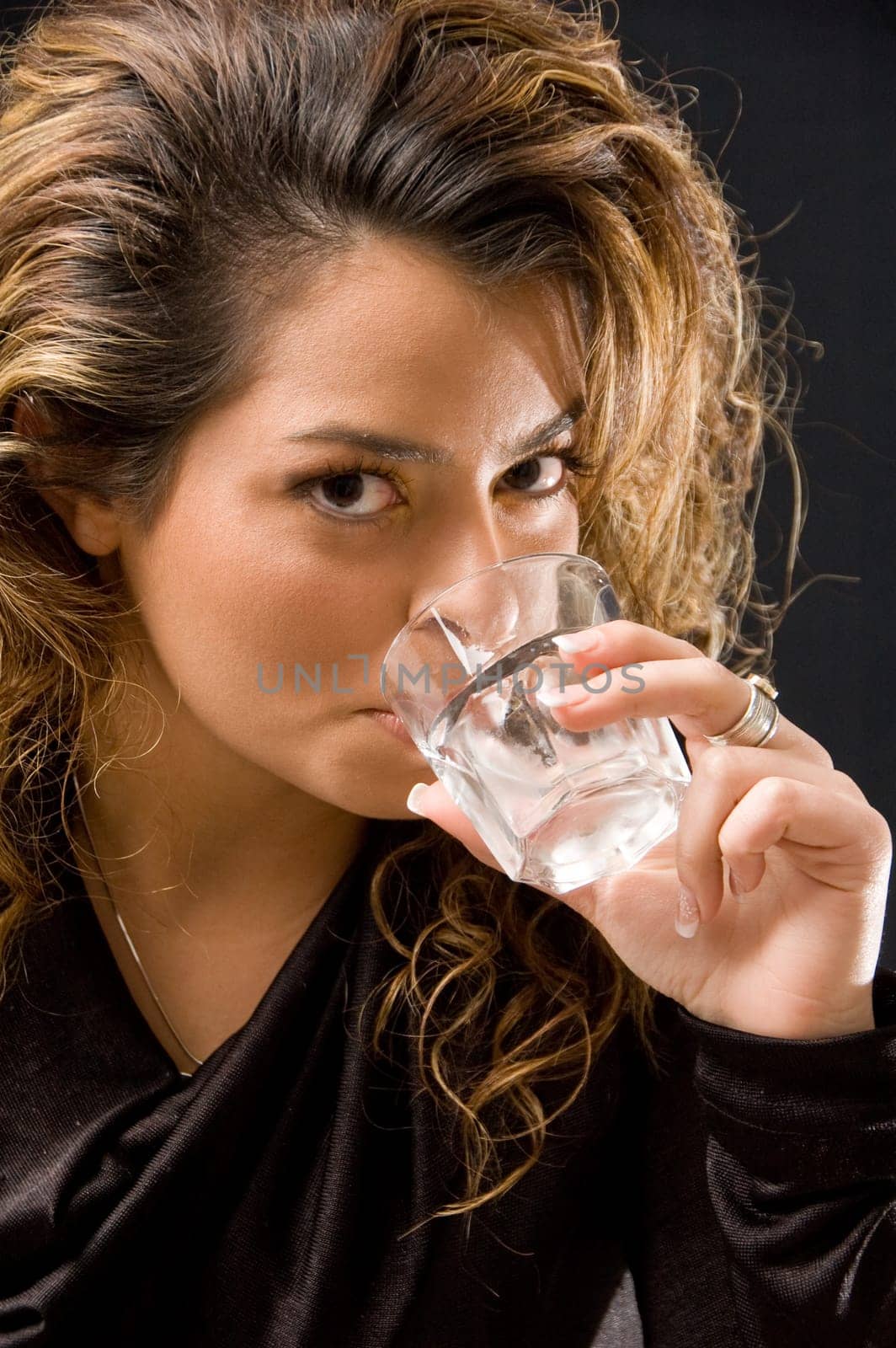 Attractive feminin drinking wine