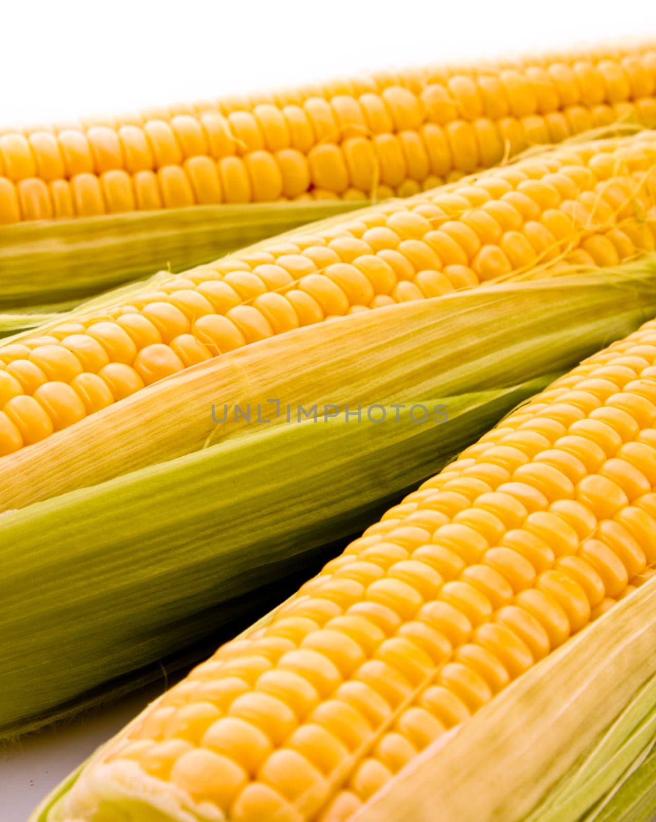 Three corns isolated on white