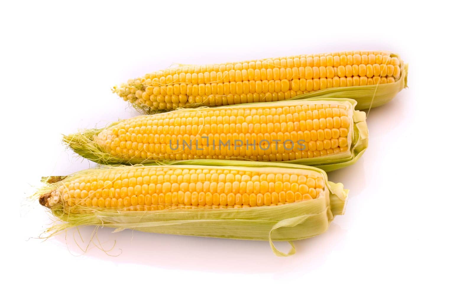 Three corns isolated on white