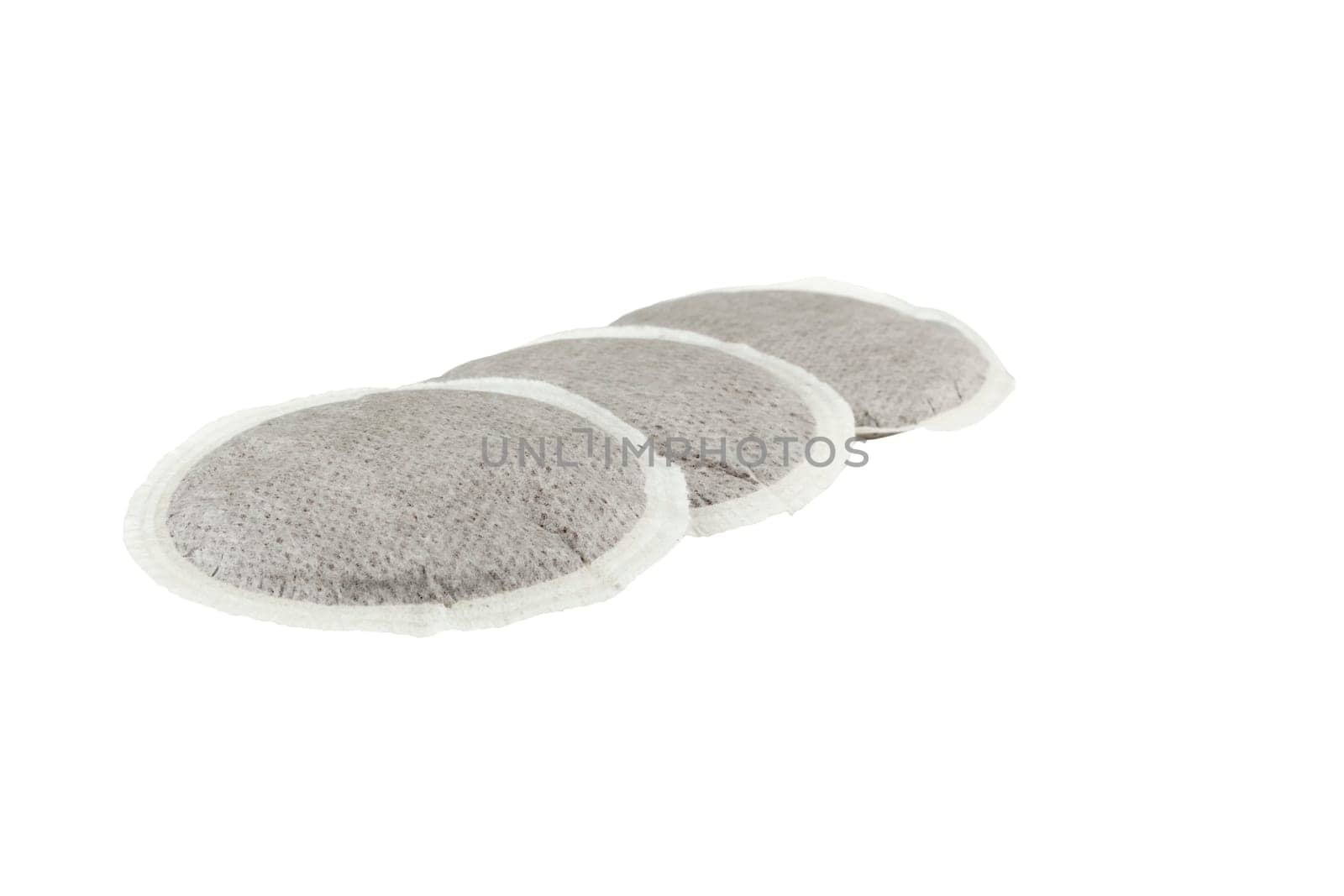 group of three coffee pads isolated on white
