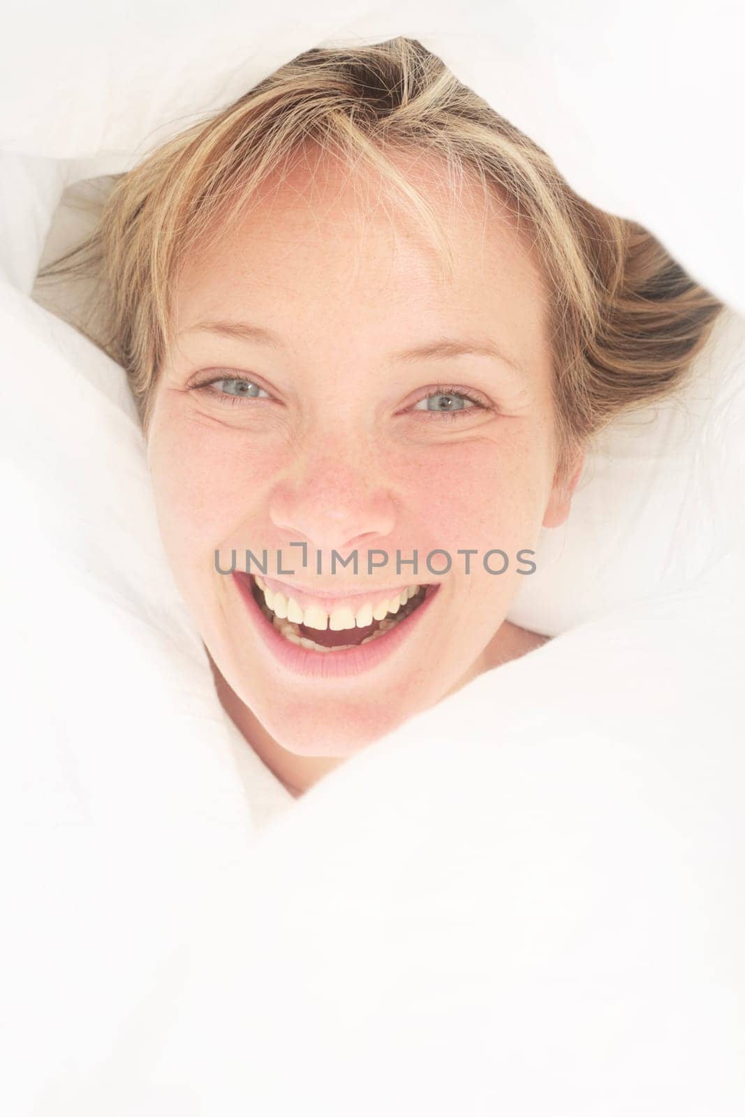 Portrait of a pretty girl in bed