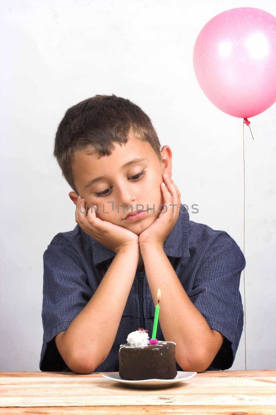 Sad boy on his birthday