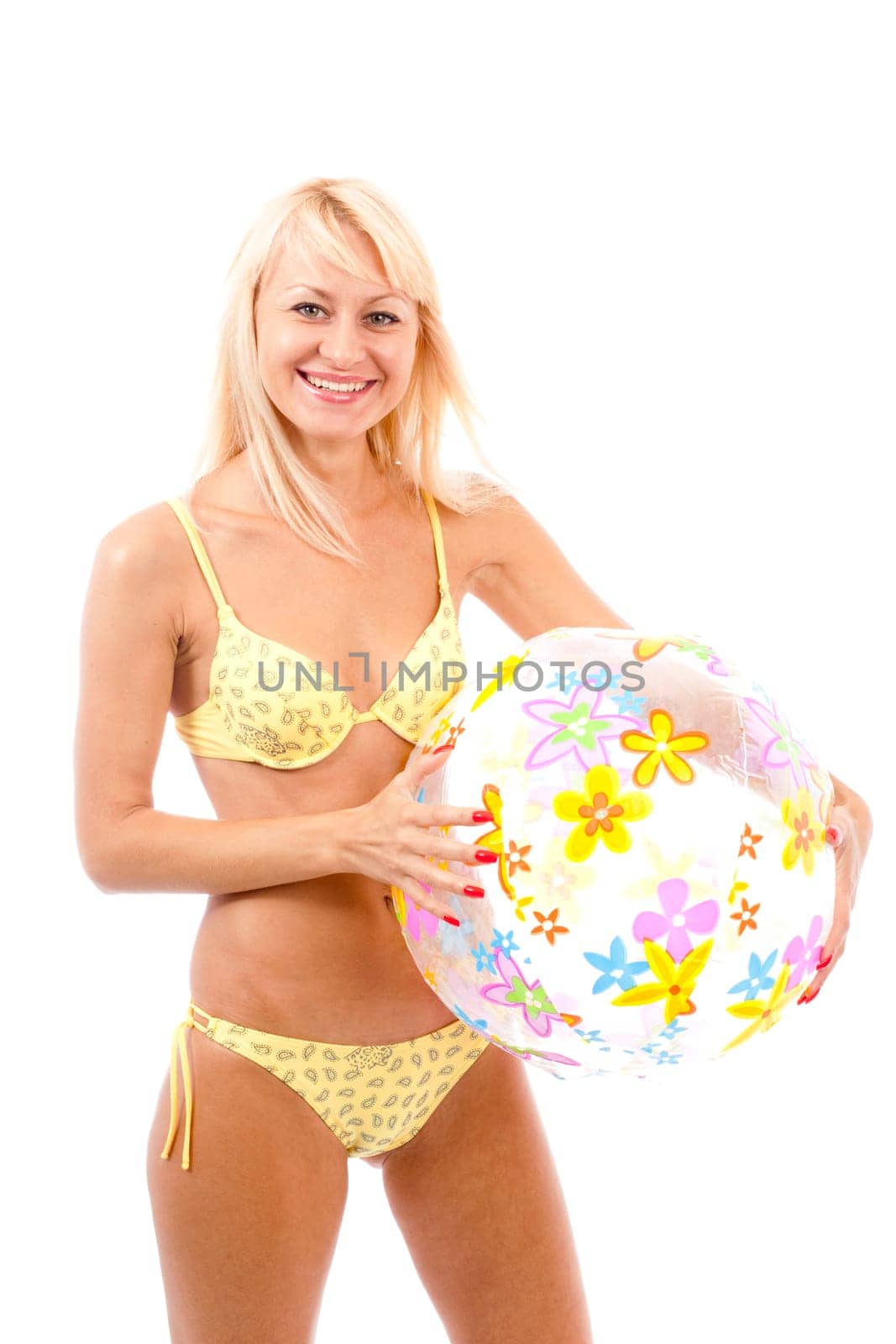 pretty long hair blond woman in yellow bikini with ball