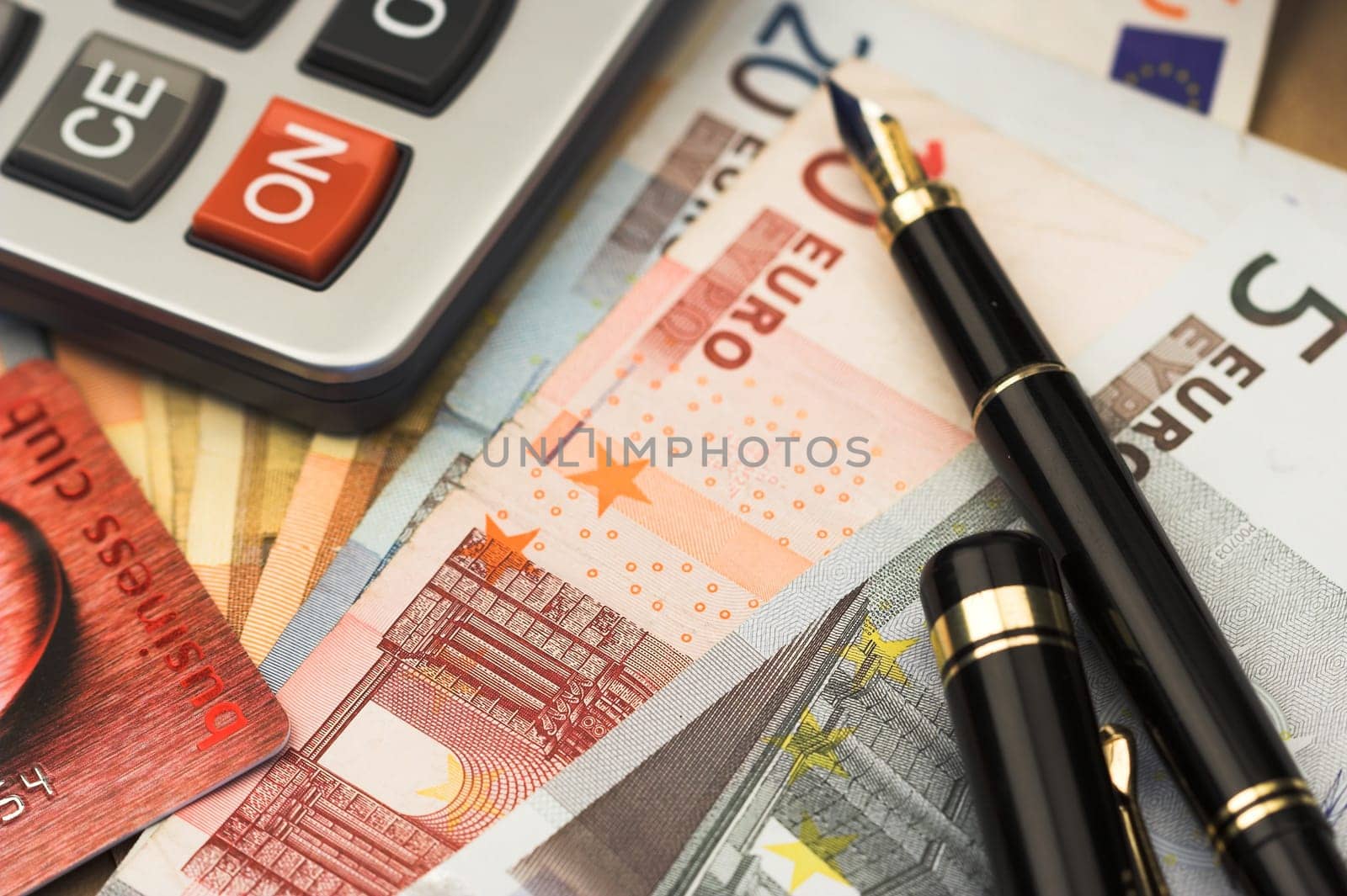 bills,pen and calculator close up