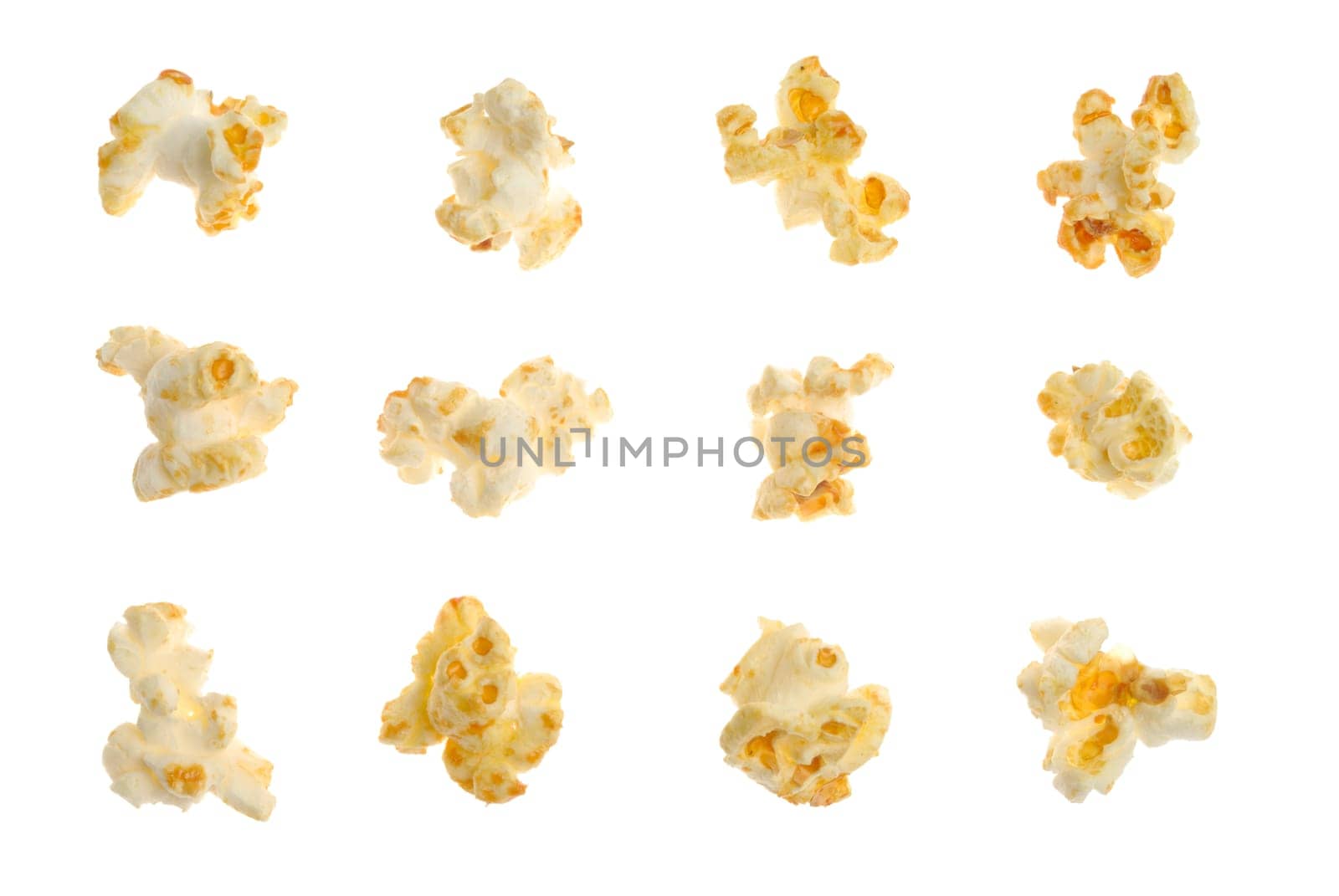 Popped kernels of corn isolated over white background