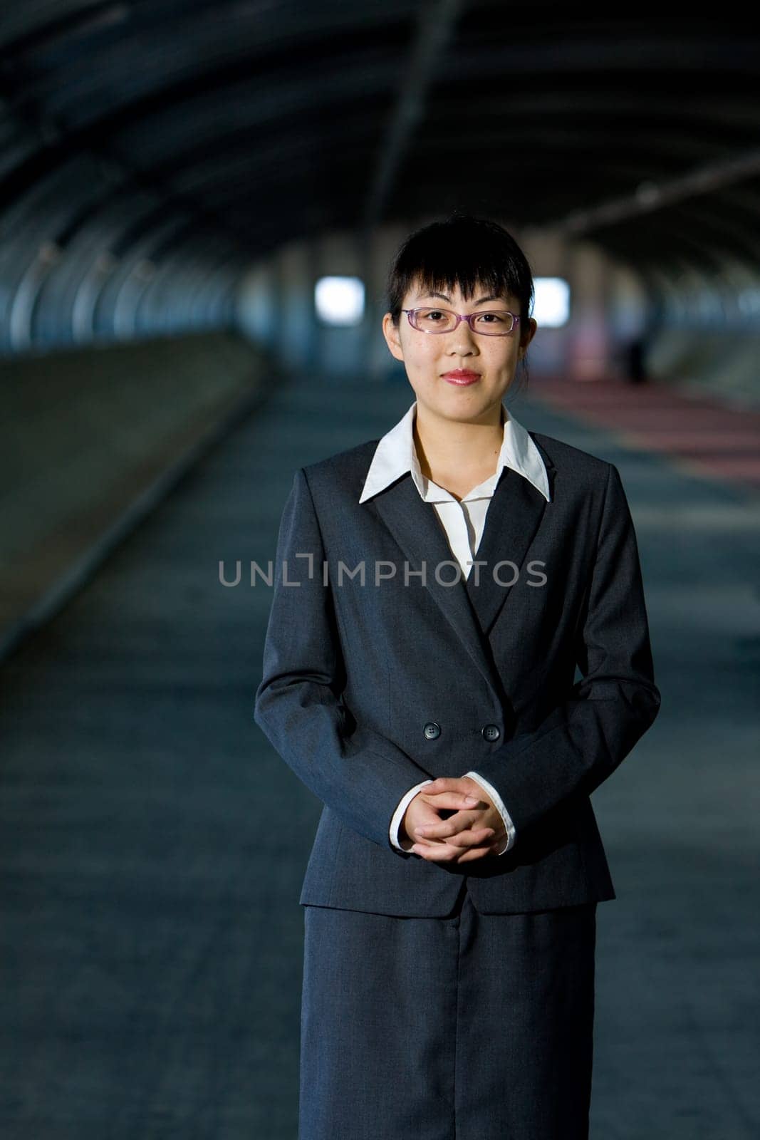 Young asian business woman standing pose with confident