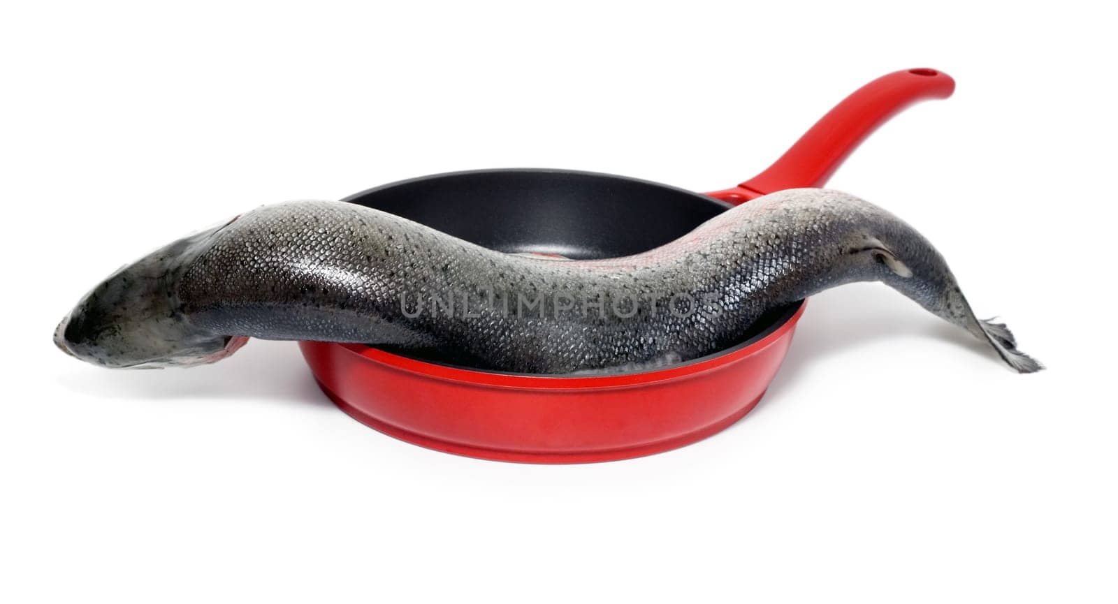 Cooking fish in frying pan isolated on white background