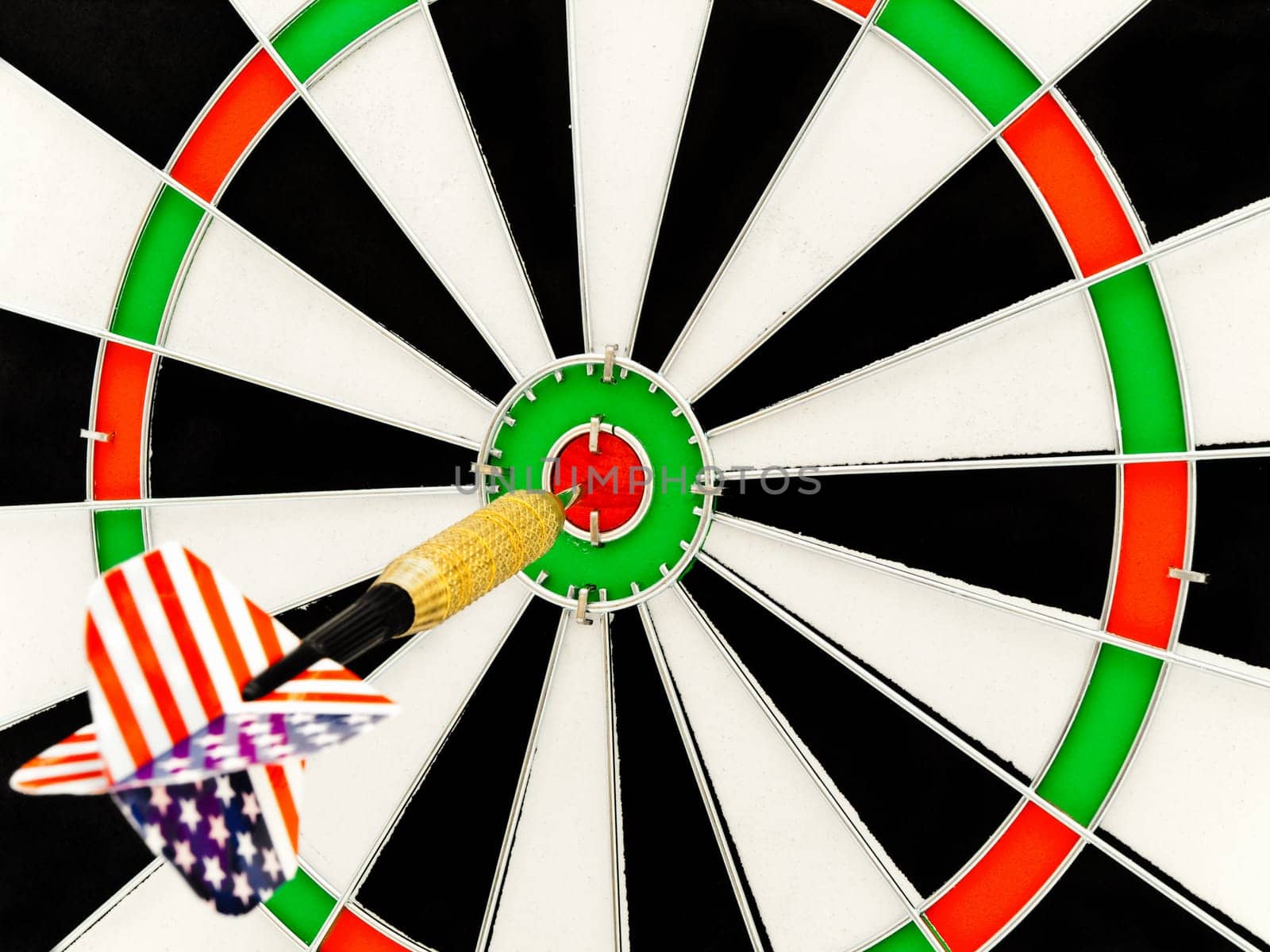 photo of the darts arrow go exactly on target