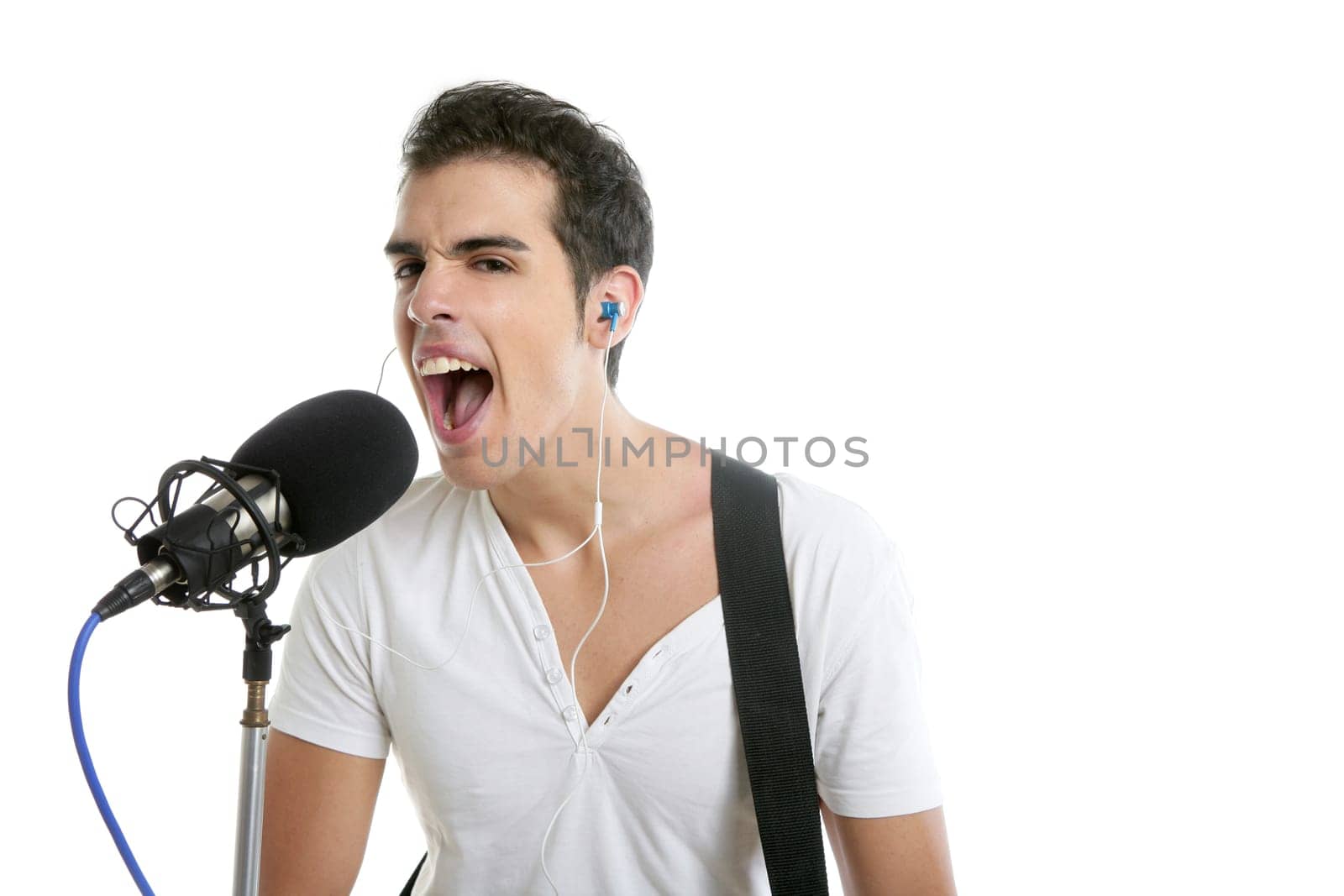 Musician young man playing electric guitar isolated on white